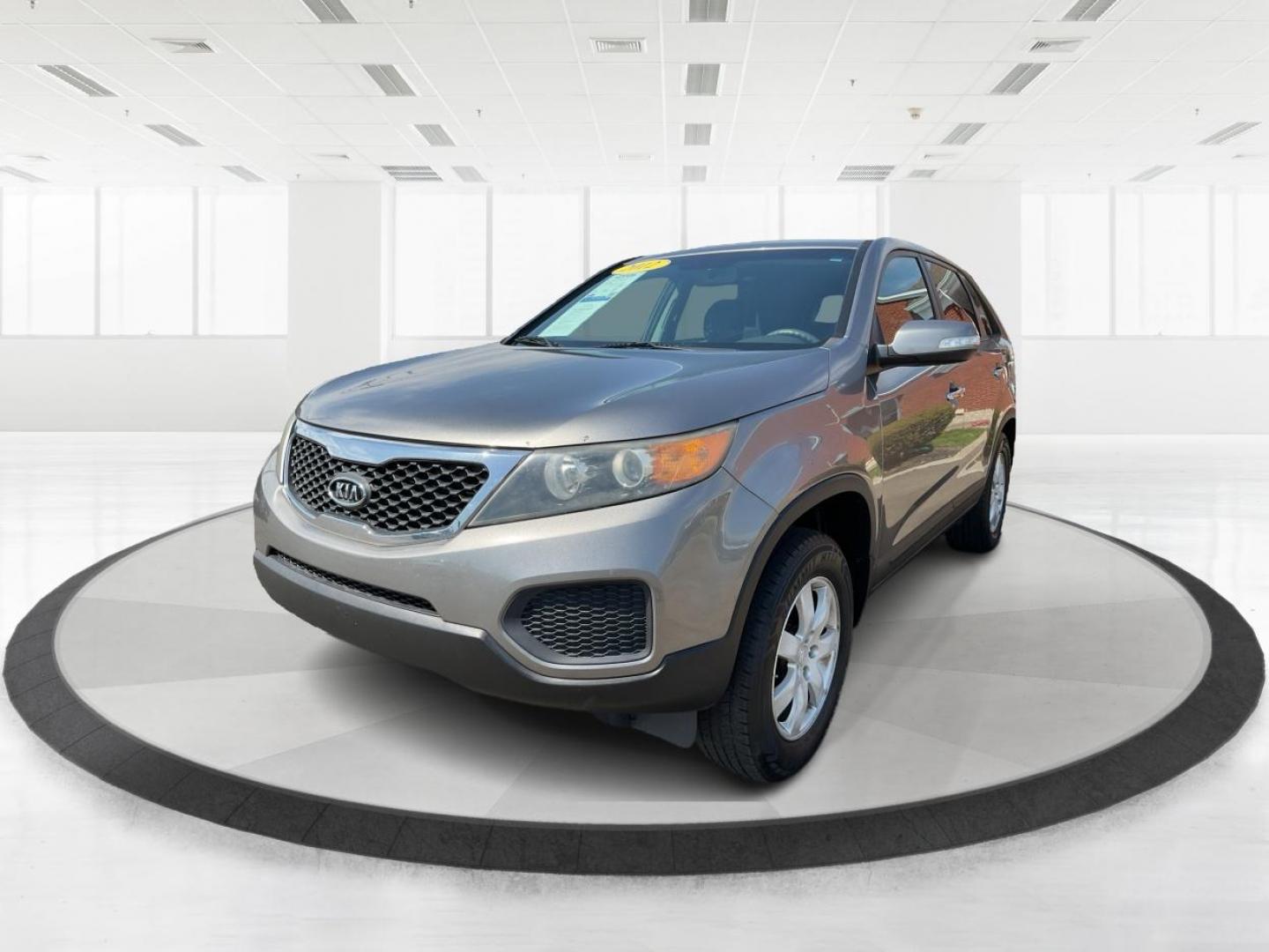 2012 Kia Sorento LX (5XYKT3A17CG) with an 2.4L I-4 DOHC engine, located at 401 Woodman Dr, Riverside, OH, 45431, (937) 908-9800, 39.760899, -84.123421 - Photo#7