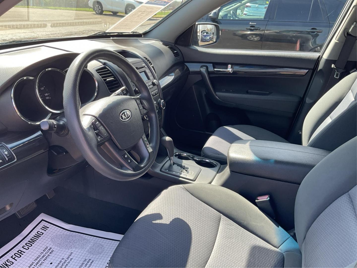 2012 Kia Sorento LX (5XYKT3A17CG) with an 2.4L I-4 DOHC engine, located at 401 Woodman Dr, Riverside, OH, 45431, (937) 908-9800, 39.760899, -84.123421 - Photo#8