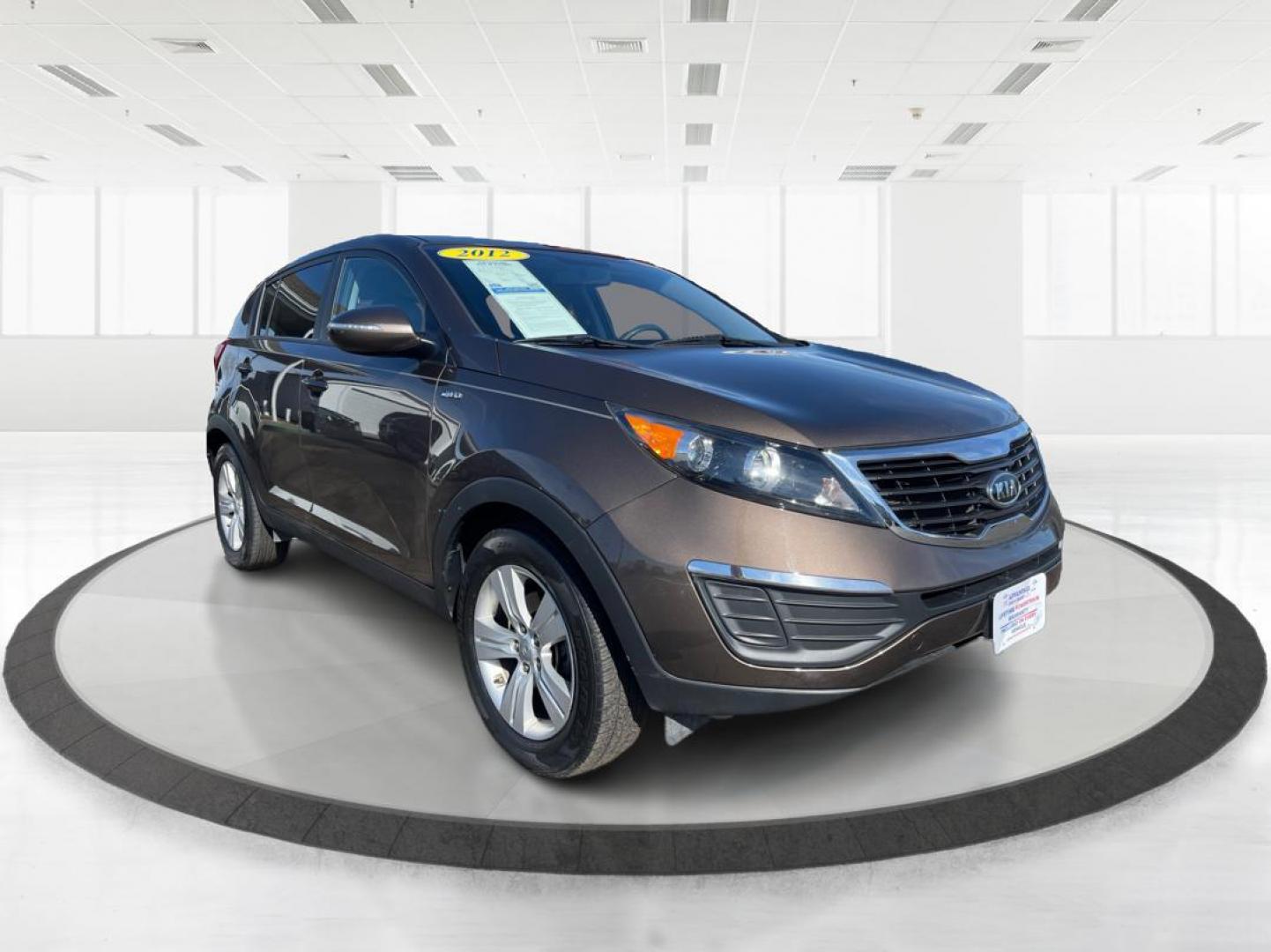 2012 Kia Sportage LX (KNDPBCA20C7) with an 2.4L I-4 DOHC engine, located at 401 Woodman Dr, Riverside, OH, 45431, (937) 908-9800, 39.760899, -84.123421 - Photo#0