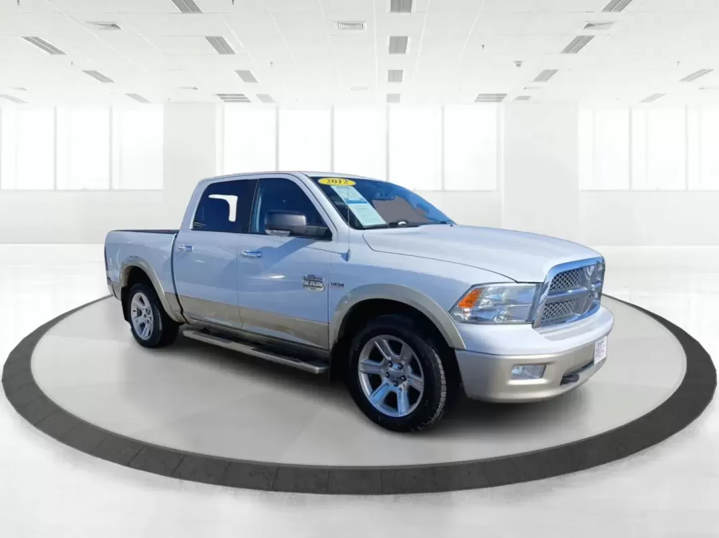 2012 Ram 1500 Laramie Longhorn Edition Crew Cab 4WD (1C6RD7PT8CS) with an 5.7L V8 OHV 16V engine, 6-Speed Automatic transmission, located at 4508 South Dixie Dr, Moraine, OH, 45439, (937) 908-9800, 39.689976, -84.218452 - Photo#0