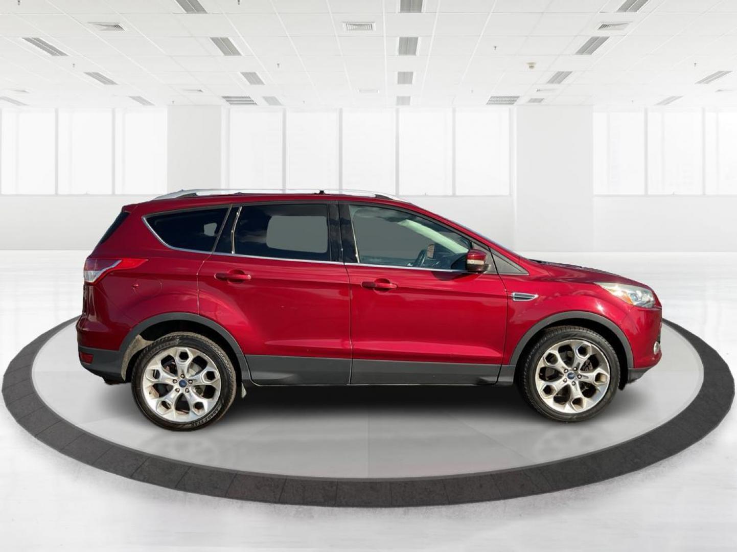 2013 Ford Escape Titanium (1FMCU0J94DU) with an EcoBoost 2L I-4 gasoline direct injection engine, located at 1184 Kauffman Ave, Fairborn, OH, 45324, (937) 908-9800, 39.807072, -84.030914 - Photo#1