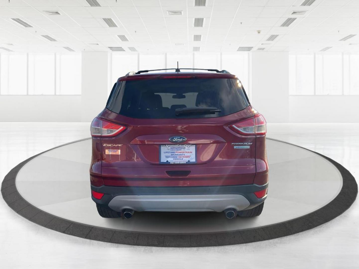2013 Ford Escape Titanium (1FMCU0J94DU) with an EcoBoost 2L I-4 gasoline direct injection engine, located at 1184 Kauffman Ave, Fairborn, OH, 45324, (937) 908-9800, 39.807072, -84.030914 - Photo#2