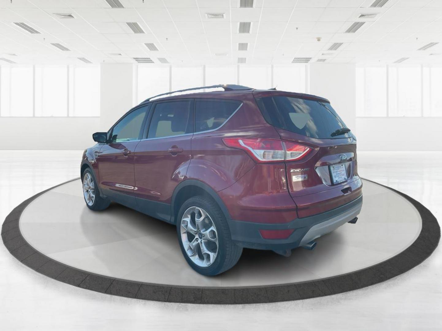 2013 Ford Escape Titanium (1FMCU0J94DU) with an EcoBoost 2L I-4 gasoline direct injection engine, located at 1184 Kauffman Ave, Fairborn, OH, 45324, (937) 908-9800, 39.807072, -84.030914 - Photo#3