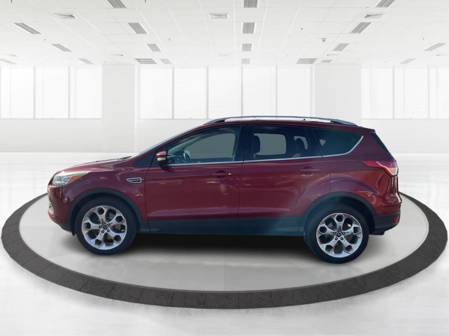 2013 Ford Escape Titanium (1FMCU0J94DU) with an EcoBoost 2L I-4 gasoline direct injection engine, located at 1184 Kauffman Ave, Fairborn, OH, 45324, (937) 908-9800, 39.807072, -84.030914 - Photo#4
