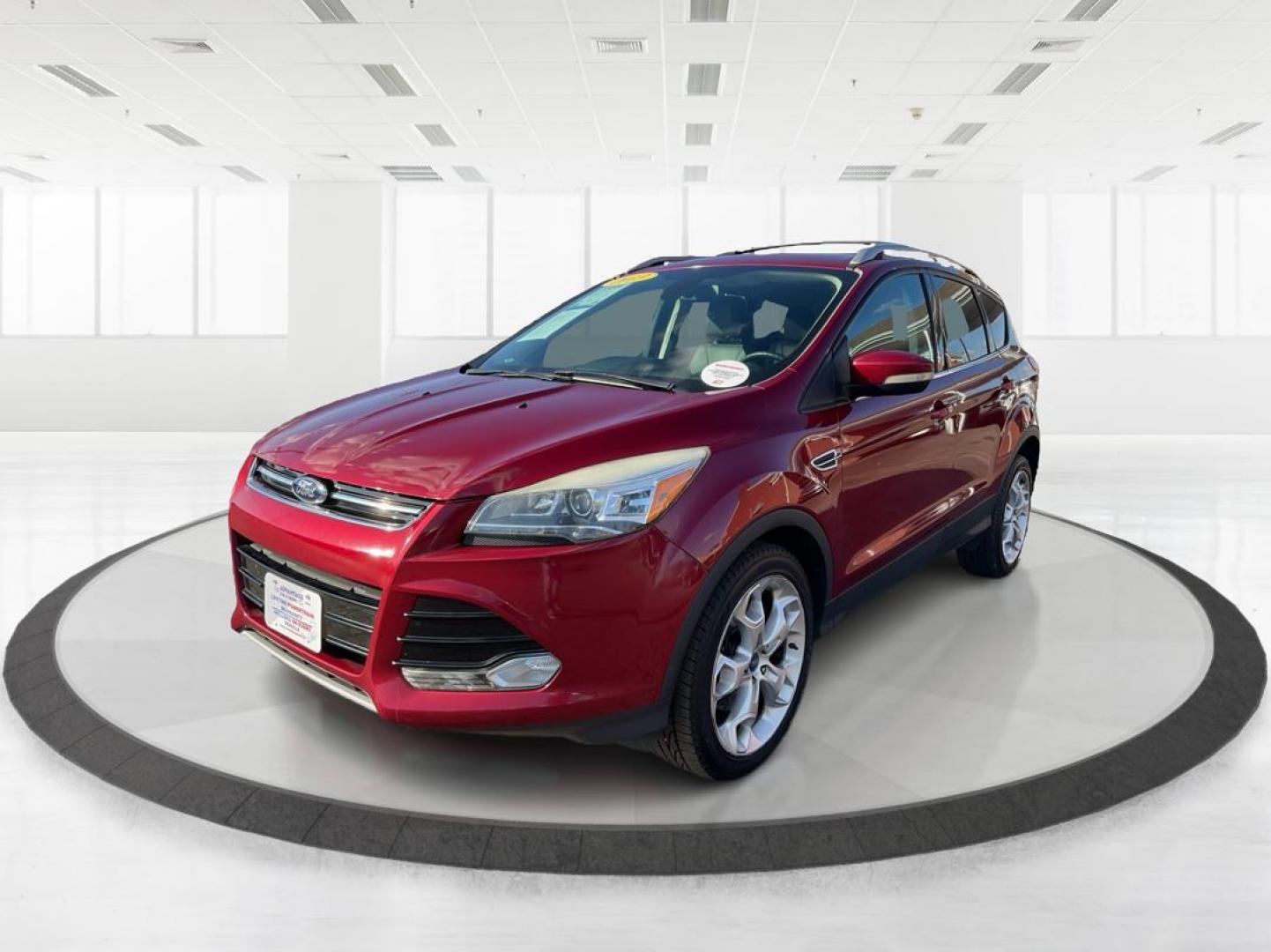 2013 Ford Escape Titanium (1FMCU0J94DU) with an EcoBoost 2L I-4 gasoline direct injection engine, located at 1184 Kauffman Ave, Fairborn, OH, 45324, (937) 908-9800, 39.807072, -84.030914 - Photo#6