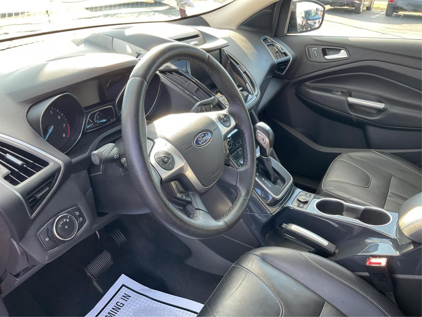 2013 Ford Escape Titanium (1FMCU0J94DU) with an EcoBoost 2L I-4 gasoline direct injection engine, located at 1184 Kauffman Ave, Fairborn, OH, 45324, (937) 908-9800, 39.807072, -84.030914 - Photo#7