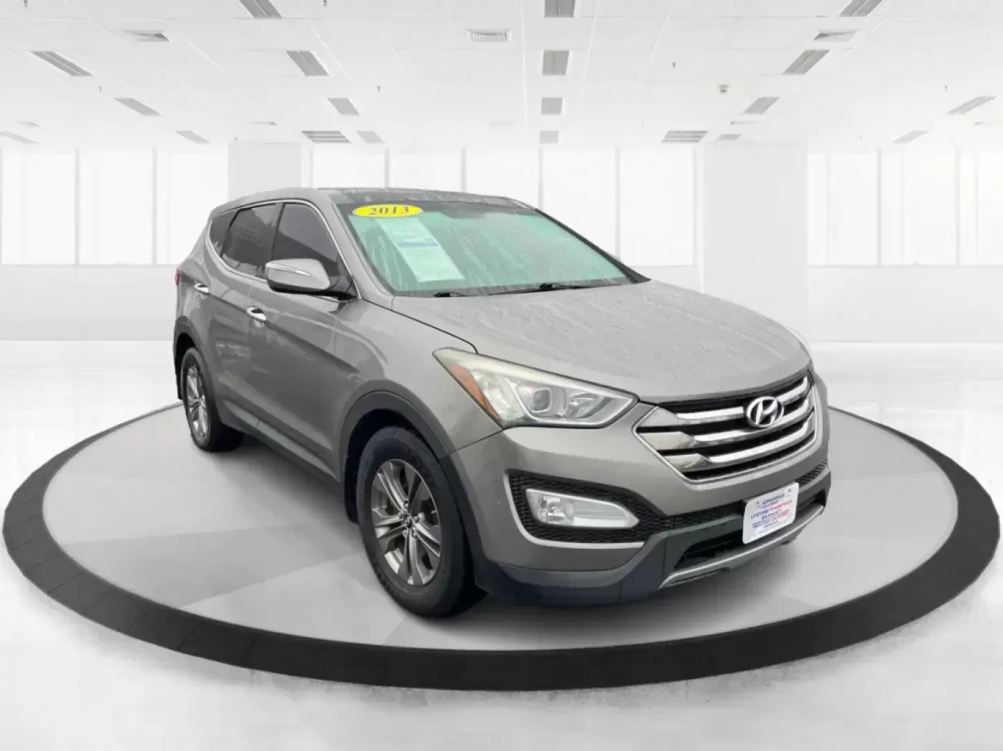 2013 Mineral Gray Hyundai Santa Fe Sport 2.4 AWD (5XYZUDLBXDG) with an 2.4L L4 DOHC 16V engine, 6-Speed Automatic transmission, located at 1184 Kauffman Ave, Fairborn, OH, 45324, (937) 908-9800, 39.807072, -84.030914 - Photo#0