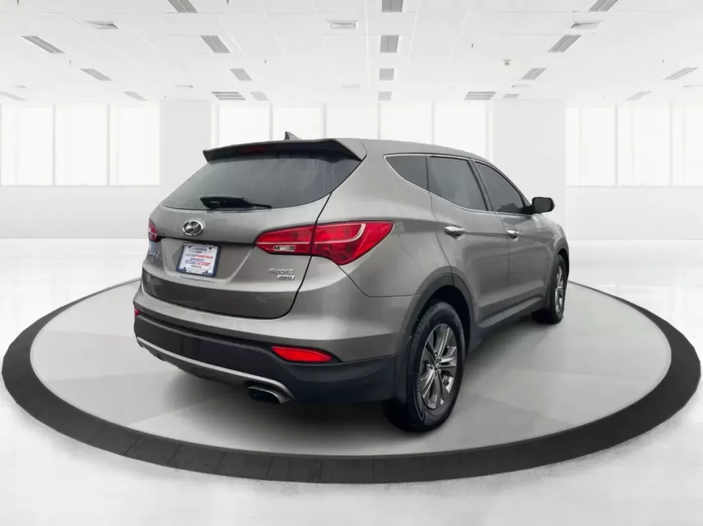 2013 Mineral Gray Hyundai Santa Fe Sport 2.4 AWD (5XYZUDLBXDG) with an 2.4L L4 DOHC 16V engine, 6-Speed Automatic transmission, located at 1184 Kauffman Ave, Fairborn, OH, 45324, (937) 908-9800, 39.807072, -84.030914 - Photo#2