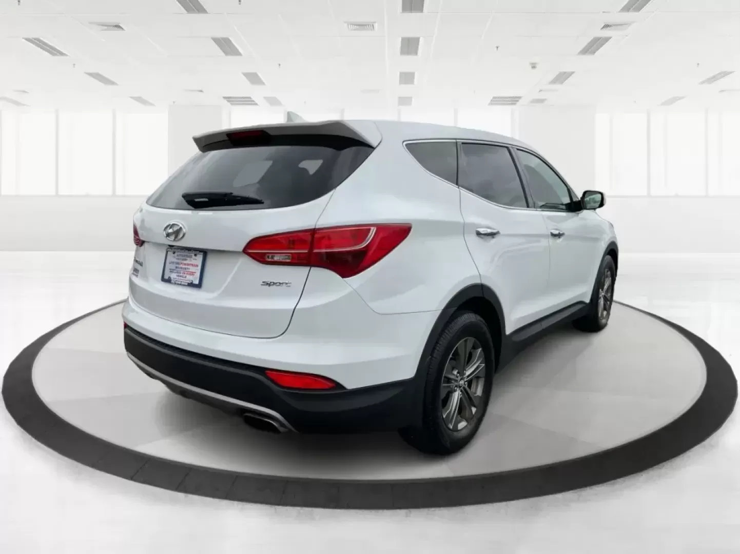 2013 Hyundai Santa Fe Sport (5XYZU3LB9DG) with an Theta II 2.4L I-4 gasoline direct injection engine, located at 4508 South Dixie Dr, Moraine, OH, 45439, (937) 908-9800, 39.689976, -84.218452 - Photo#2