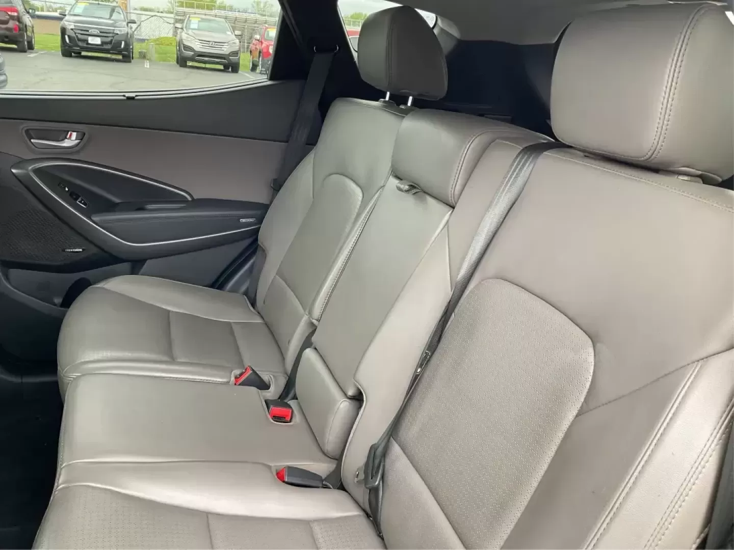 2013 Hyundai Santa Fe Sport (5XYZU3LB9DG) with an Theta II 2.4L I-4 gasoline direct injection engine, located at 4508 South Dixie Dr, Moraine, OH, 45439, (937) 908-9800, 39.689976, -84.218452 - Photo#9