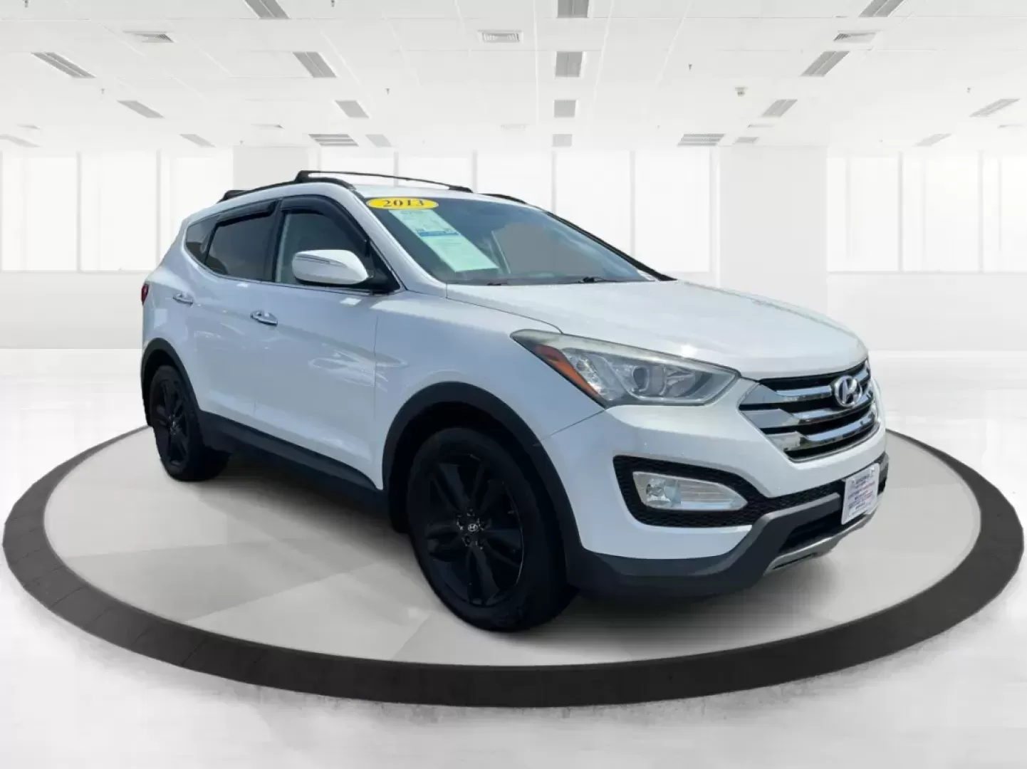 2013 Hyundai Santa Fe Sport 2.0T (5XYZUDLA1DG) with an Theta II 2L I-4 gasoline direct injection engine, located at 1230 East Main St, Xenia, OH, 45385, (937) 908-9800, 39.688026, -83.910172 - Photo#0