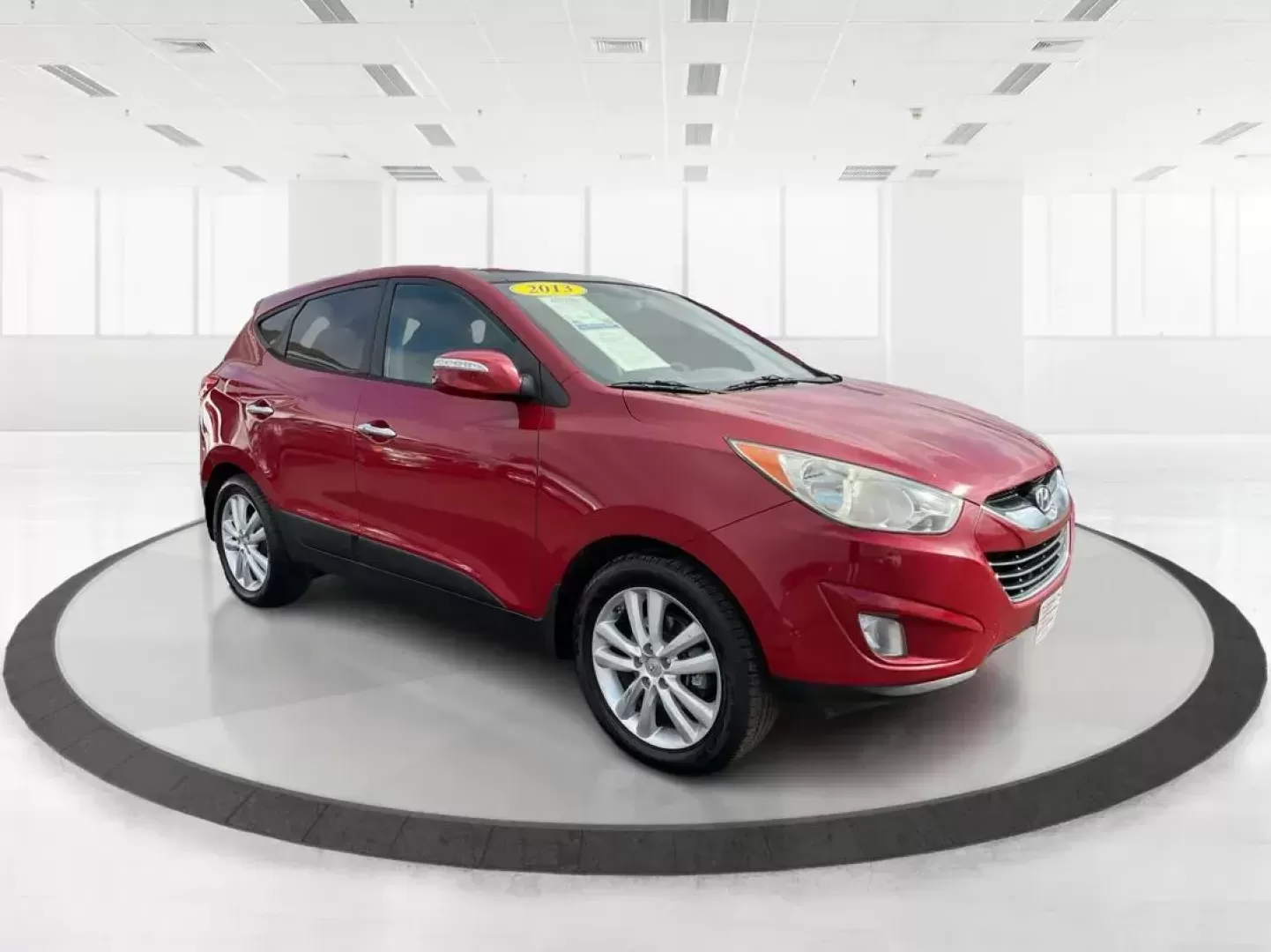 2013 Hyundai Tucson Limited (KM8JU3AC4DU) with an Theta II 2.4L I-4 DOHC engine, located at 1099 N County Rd 25A , Troy, OH, 45373, (937) 908-9800, 40.057079, -84.212883 - Photo#0