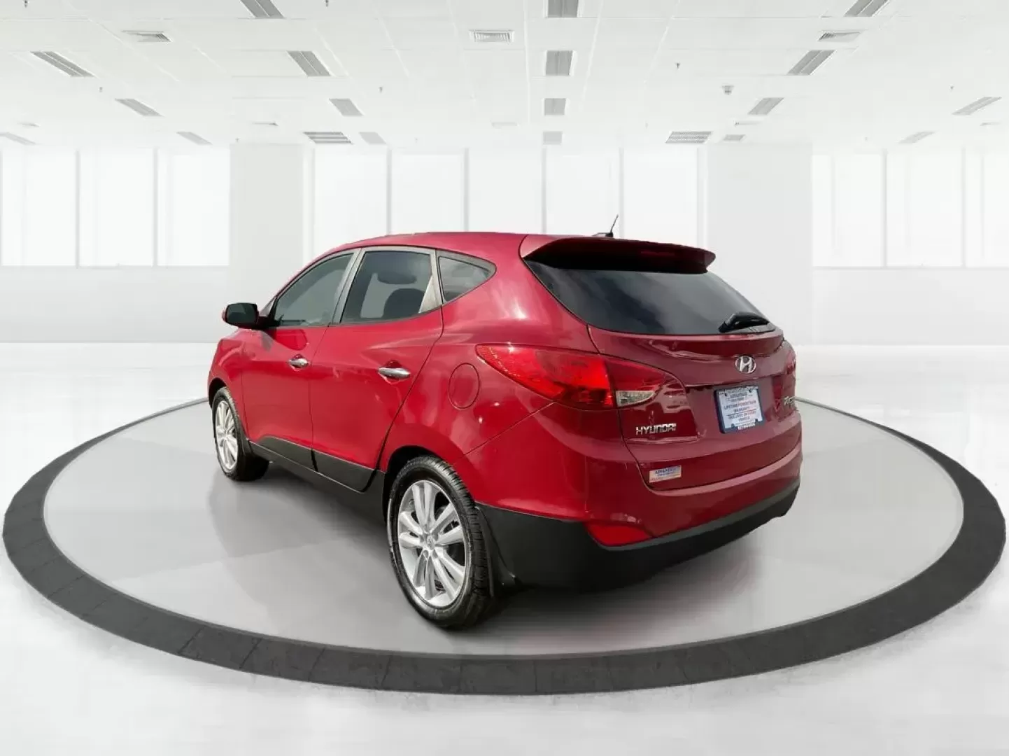 2013 Hyundai Tucson Limited (KM8JU3AC4DU) with an Theta II 2.4L I-4 DOHC engine, located at 1099 N County Rd 25A , Troy, OH, 45373, (937) 908-9800, 40.057079, -84.212883 - Photo#4