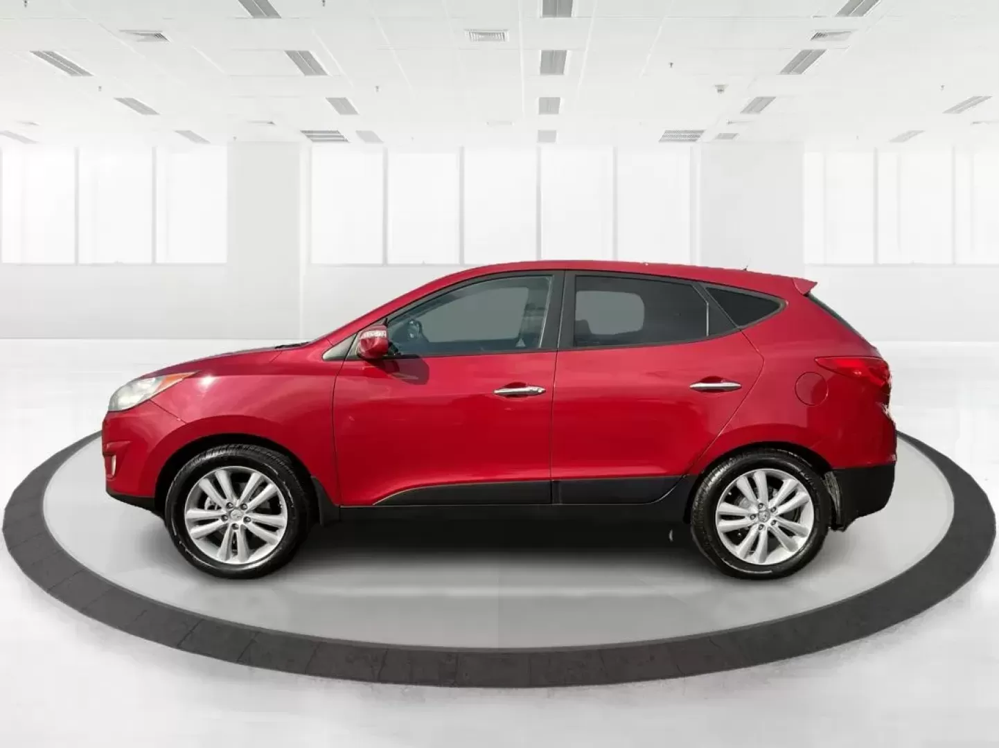 2013 Hyundai Tucson Limited (KM8JU3AC4DU) with an Theta II 2.4L I-4 DOHC engine, located at 1099 N County Rd 25A , Troy, OH, 45373, (937) 908-9800, 40.057079, -84.212883 - Photo#5