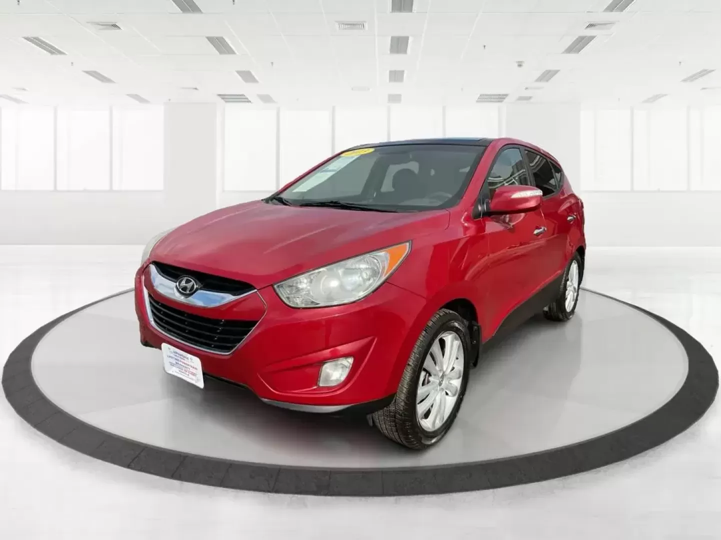 2013 Hyundai Tucson Limited (KM8JU3AC4DU) with an Theta II 2.4L I-4 DOHC engine, located at 1099 N County Rd 25A , Troy, OH, 45373, (937) 908-9800, 40.057079, -84.212883 - Photo#7