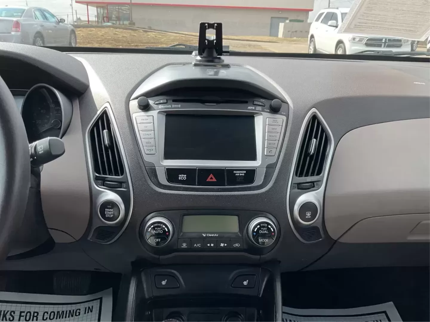 2013 Hyundai Tucson Limited (KM8JU3AC4DU) with an Theta II 2.4L I-4 DOHC engine, located at 1099 N County Rd 25A , Troy, OH, 45373, (937) 908-9800, 40.057079, -84.212883 - Photo#12