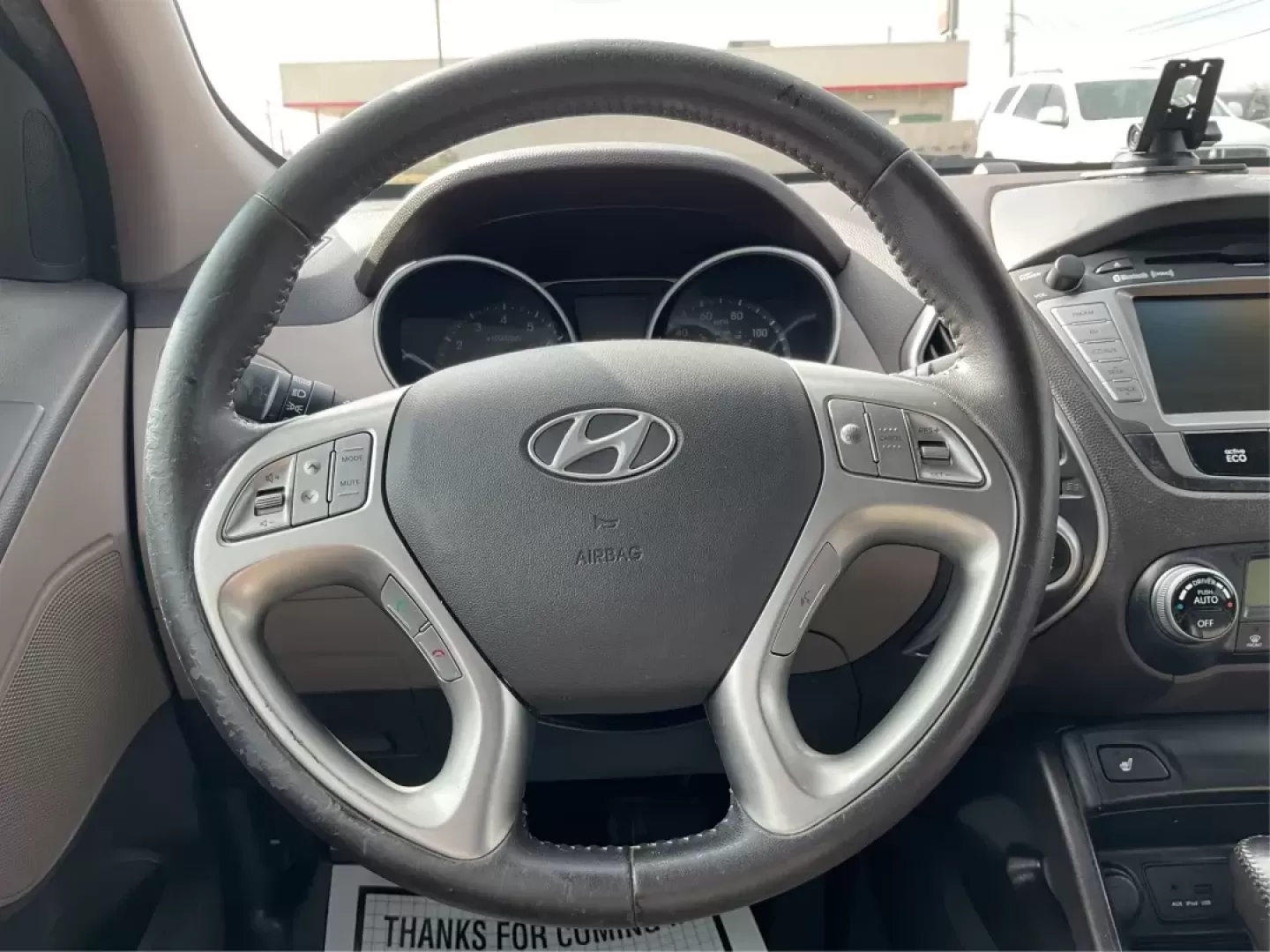 2013 Hyundai Tucson Limited (KM8JU3AC4DU) with an Theta II 2.4L I-4 DOHC engine, located at 1099 N County Rd 25A , Troy, OH, 45373, (937) 908-9800, 40.057079, -84.212883 - Photo#15
