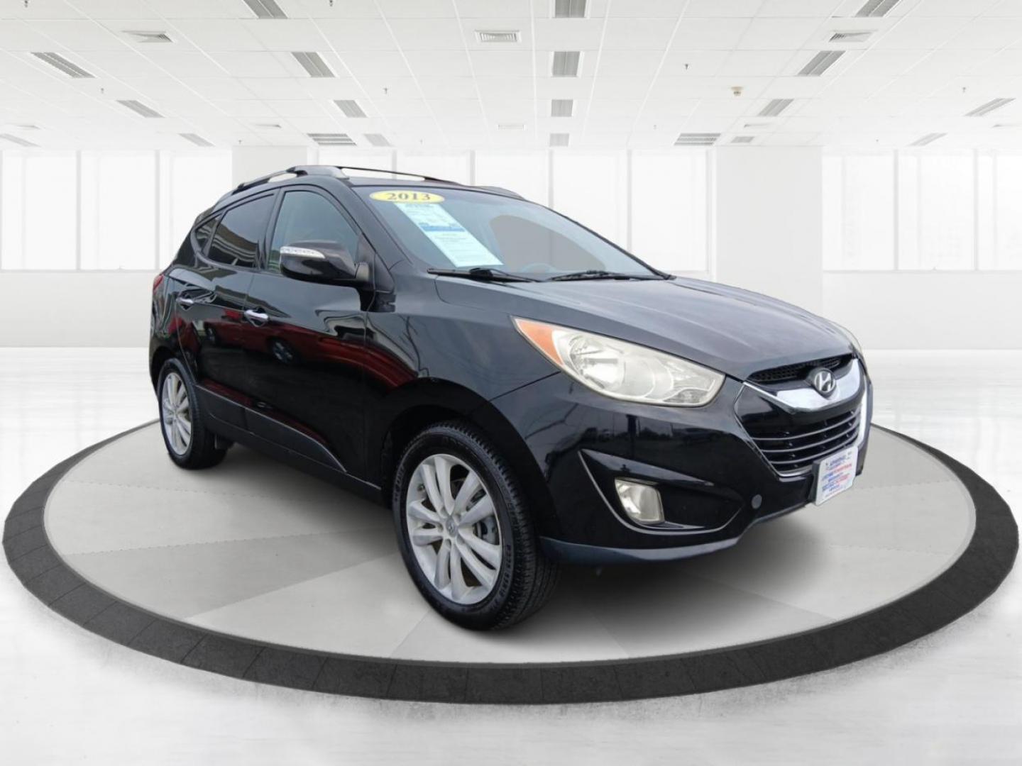 2013 Hyundai Tucson Limited 2WD (KM8JU3AC1DU) with an 2.4L L4 DOHC 16V engine, 6-Speed Automatic transmission, located at 1184 Kauffman Ave, Fairborn, OH, 45324, (937) 908-9800, 39.807072, -84.030914 - Photo#0