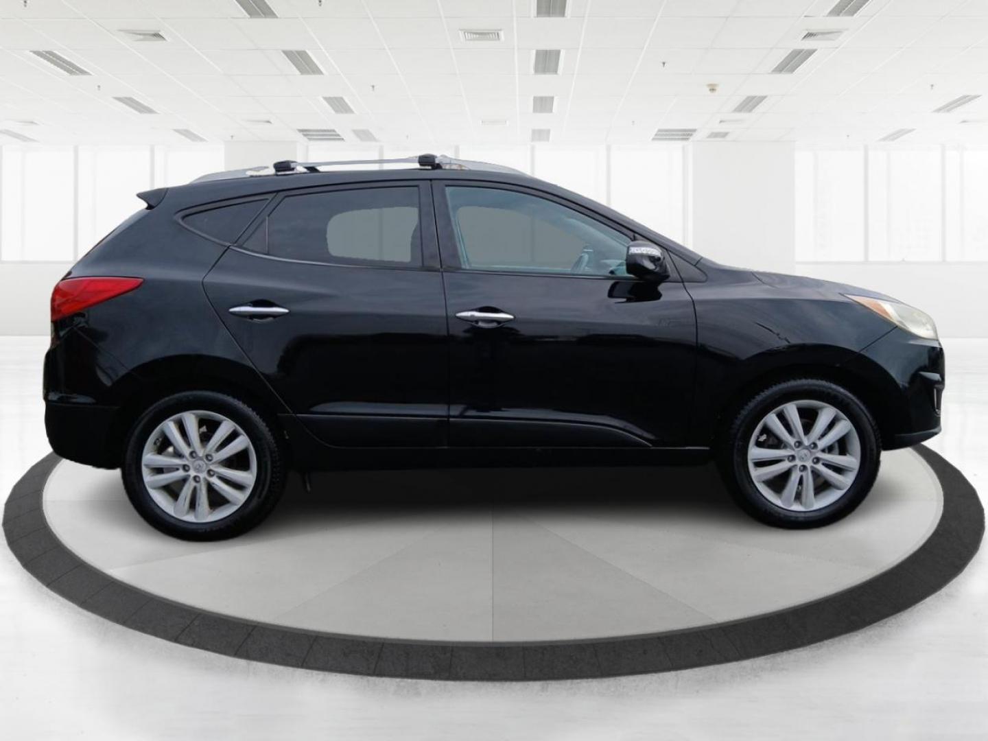 2013 Hyundai Tucson Limited 2WD (KM8JU3AC1DU) with an 2.4L L4 DOHC 16V engine, 6-Speed Automatic transmission, located at 1184 Kauffman Ave, Fairborn, OH, 45324, (937) 908-9800, 39.807072, -84.030914 - Photo#1