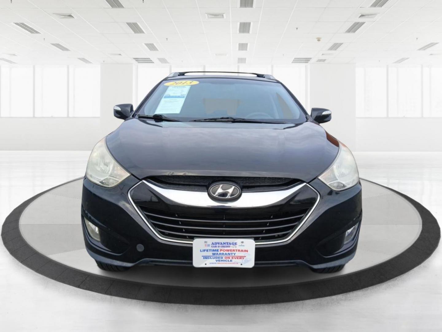 2013 Hyundai Tucson Limited 2WD (KM8JU3AC1DU) with an 2.4L L4 DOHC 16V engine, 6-Speed Automatic transmission, located at 1184 Kauffman Ave, Fairborn, OH, 45324, (937) 908-9800, 39.807072, -84.030914 - Photo#6