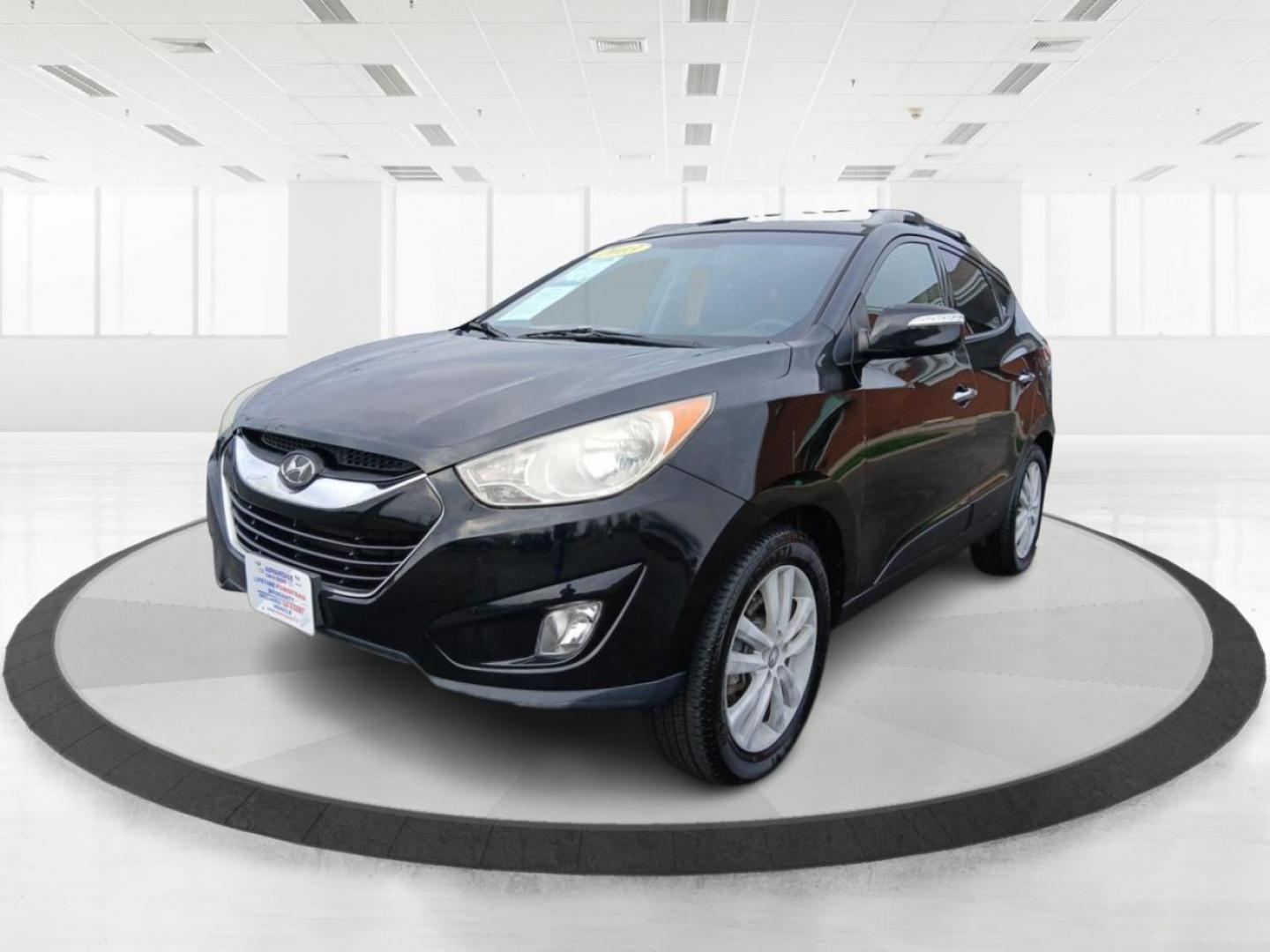 2013 Hyundai Tucson Limited 2WD (KM8JU3AC1DU) with an 2.4L L4 DOHC 16V engine, 6-Speed Automatic transmission, located at 1184 Kauffman Ave, Fairborn, OH, 45324, (937) 908-9800, 39.807072, -84.030914 - Photo#7
