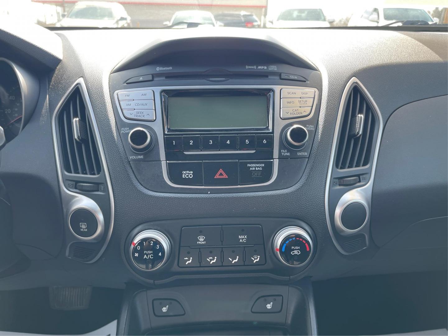 2013 Hyundai Tucson GLS (KM8JU3AC1DU) with an Theta II 2.4L I-4 DOHC engine, located at 1099 N County Rd 25A , Troy, OH, 45373, (937) 908-9800, 40.057079, -84.212883 - Photo#12