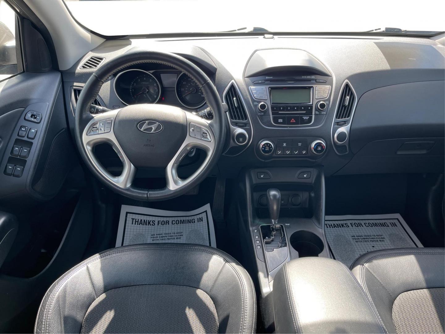 2013 Hyundai Tucson GLS (KM8JU3AC1DU) with an Theta II 2.4L I-4 DOHC engine, located at 1099 N County Rd 25A , Troy, OH, 45373, (937) 908-9800, 40.057079, -84.212883 - Photo#20
