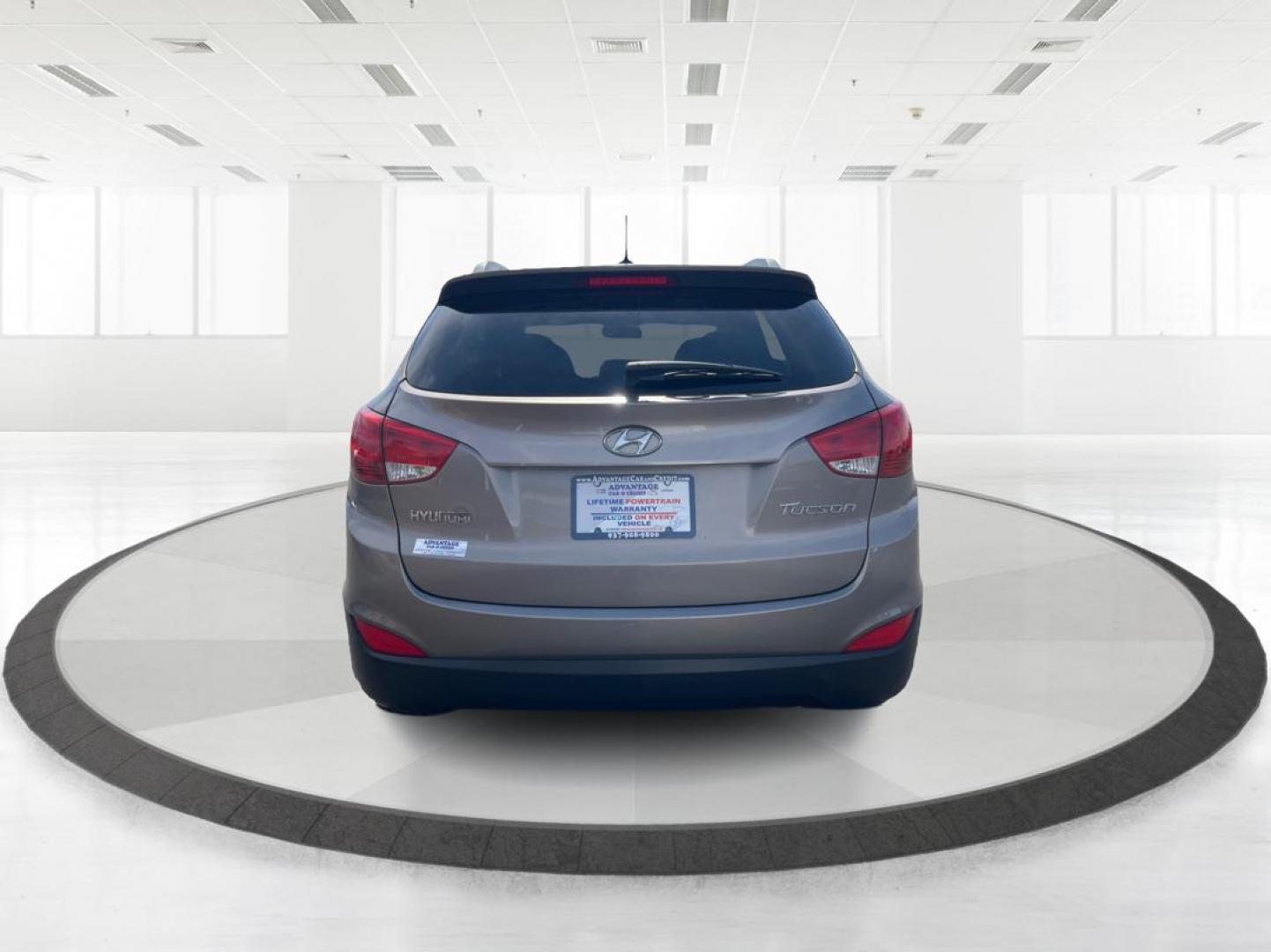 2013 Hyundai Tucson GLS (KM8JU3AC1DU) with an Theta II 2.4L I-4 DOHC engine, located at 1099 N County Rd 25A , Troy, OH, 45373, (937) 908-9800, 40.057079, -84.212883 - Photo#3