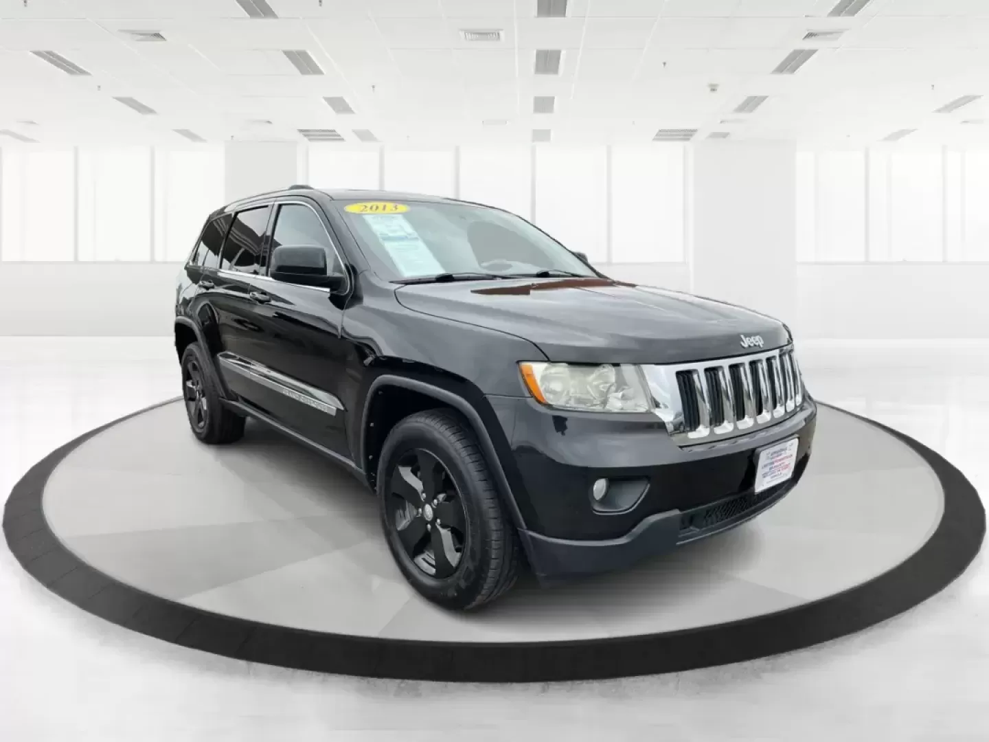 2013 Jeep Grand Cherokee Laredo (1C4RJFAGXDC) with an Other engine, located at 8750 N County Rd 25A, Piqua, OH, 45356, (937) 908-9800, 40.164391, -84.232513 - Photo#0