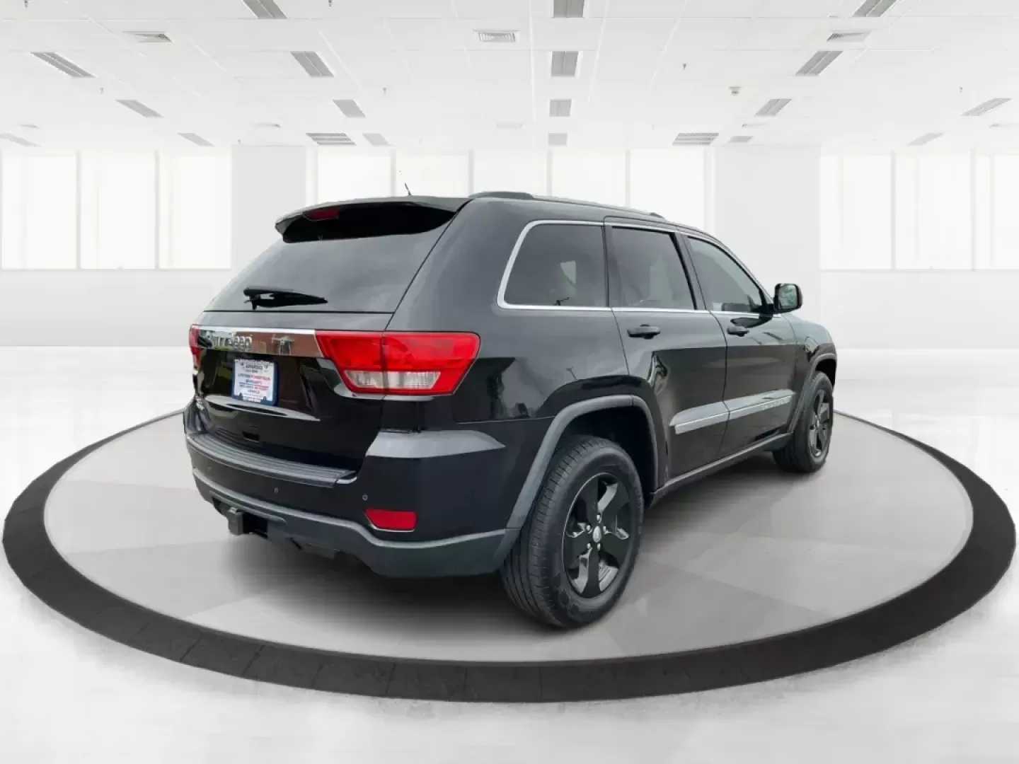 2013 Jeep Grand Cherokee Laredo (1C4RJFAGXDC) with an Other engine, located at 8750 N County Rd 25A, Piqua, OH, 45356, (937) 908-9800, 40.164391, -84.232513 - Photo#2