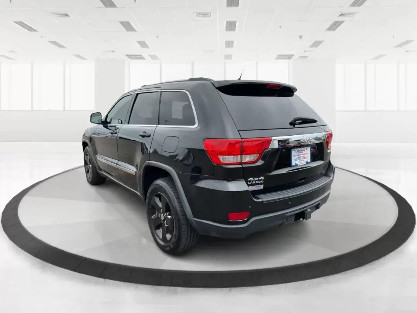 2013 Jeep Grand Cherokee Laredo (1C4RJFAGXDC) with an Other engine, located at 8750 N County Rd 25A, Piqua, OH, 45356, (937) 908-9800, 40.164391, -84.232513 - Photo#5
