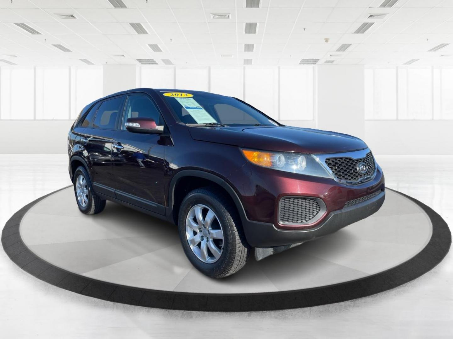 2013 Kia Sorento LX 2WD (5XYKT3A14DG) with an 2.4L L4 DOHC 16V engine, 6-Speed Automatic transmission, located at 8750 N County Rd 25A, Piqua, OH, 45356, (937) 908-9800, 40.164391, -84.232513 - Photo#0