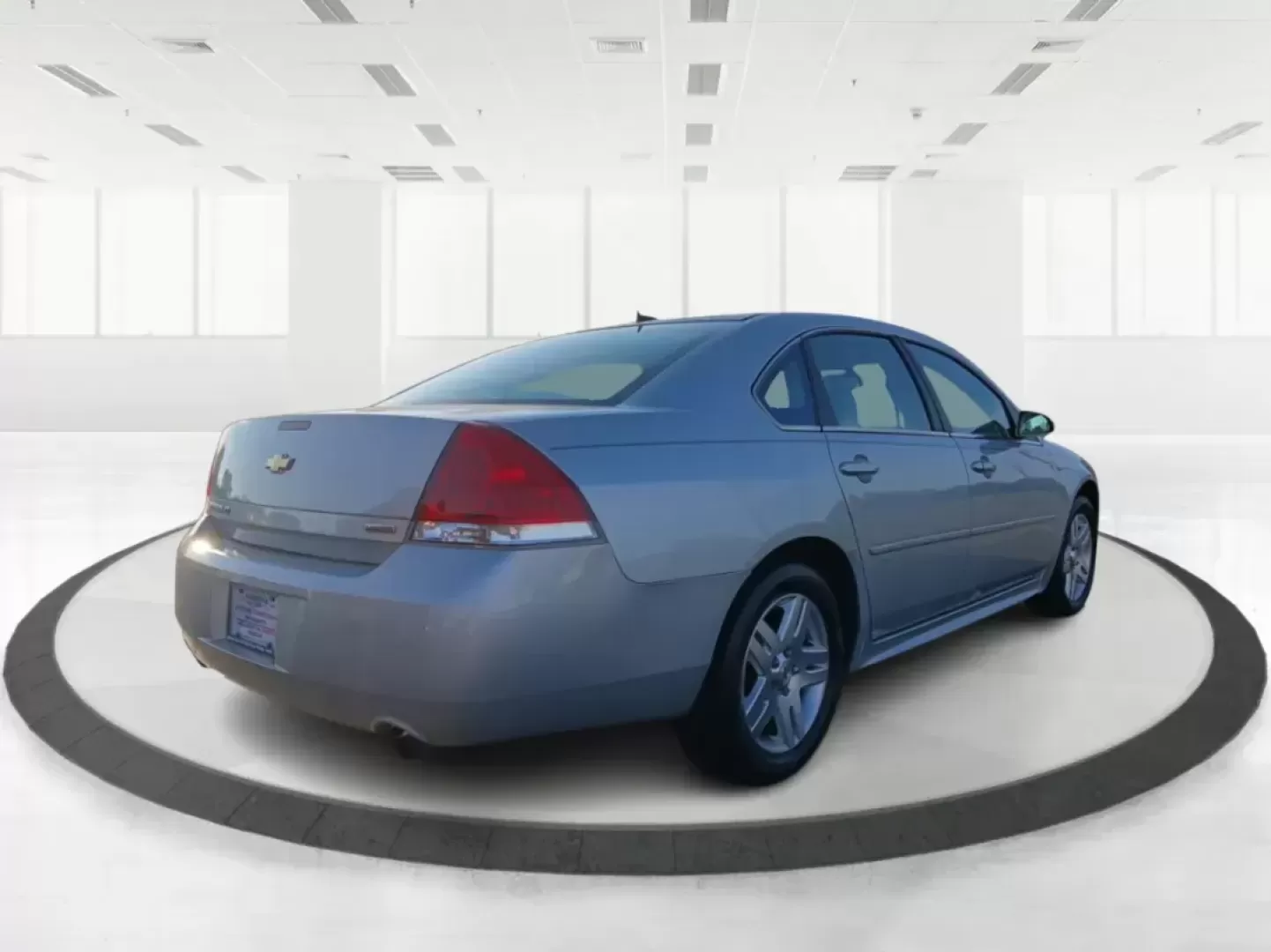 2014 Chevrolet Impala Limited LT (2G1WB5E3XE1) with an 3.6L V6 DOHC 16V FFV engine, 6-Speed Automatic transmission, located at 8750 N County Rd 25A, Piqua, OH, 45356, (937) 908-9800, 40.164391, -84.232513 - Photo#2