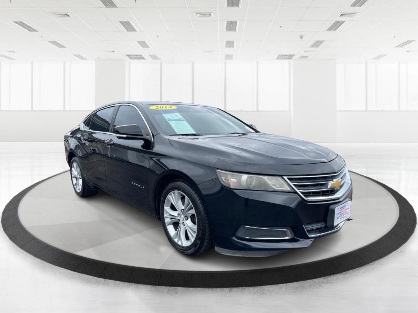 2014 Black Chevrolet Impala 2LT (2G1125S32E9) with an 3.6L V6 DOHC 24VV FFV engine, 6-Speed Automatic transmission, located at 1099 N County Rd 25A , Troy, OH, 45373, (937) 908-9800, 40.057079, -84.212883 - Photo#0