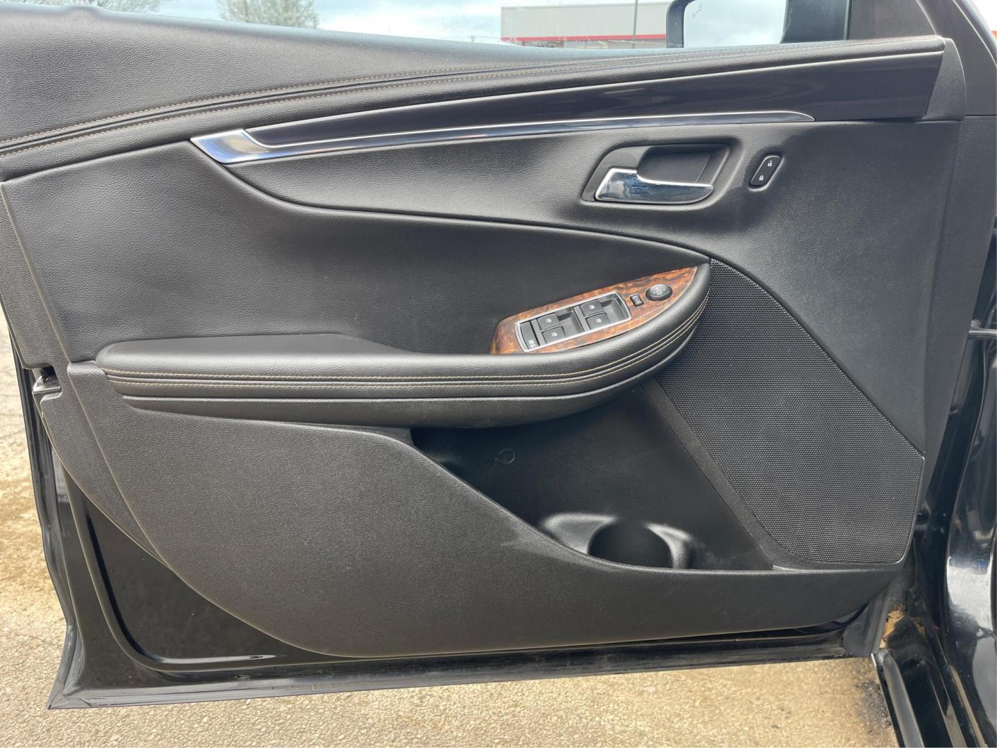 2014 Black Chevrolet Impala 2LT (2G1125S32E9) with an 3.6L V6 DOHC 24VV FFV engine, 6-Speed Automatic transmission, located at 1099 N County Rd 25A , Troy, OH, 45373, (937) 908-9800, 40.057079, -84.212883 - Photo#18
