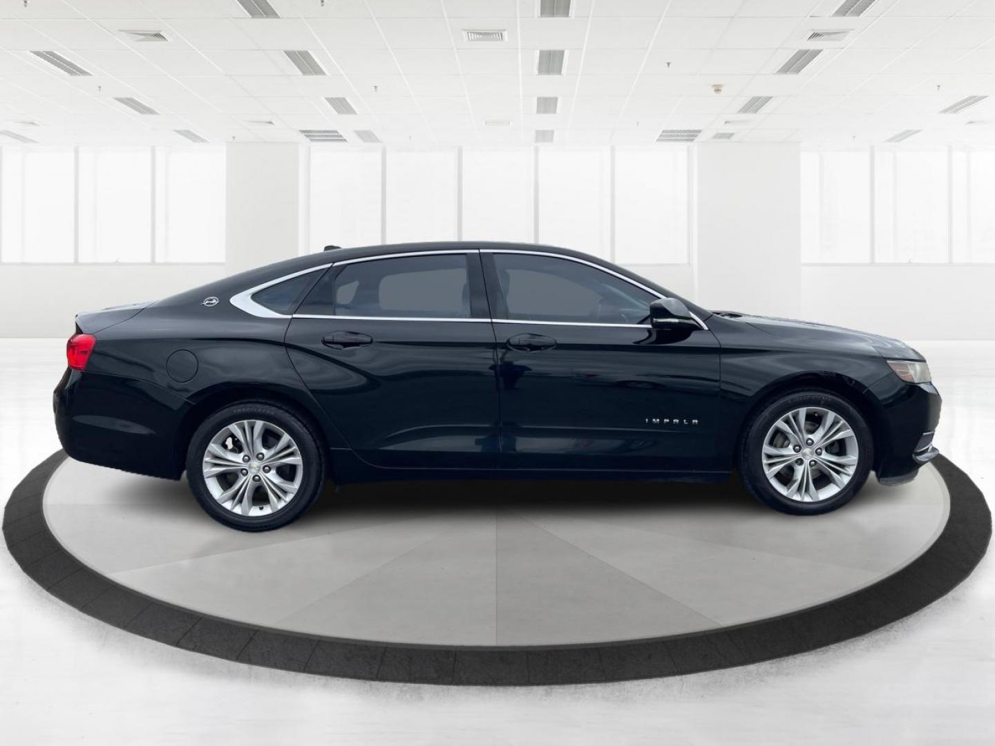 2014 Black Chevrolet Impala 2LT (2G1125S32E9) with an 3.6L V6 DOHC 24VV FFV engine, 6-Speed Automatic transmission, located at 1099 N County Rd 25A , Troy, OH, 45373, (937) 908-9800, 40.057079, -84.212883 - Photo#1