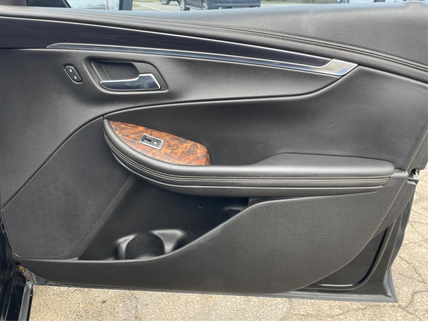 2014 Black Chevrolet Impala 2LT (2G1125S32E9) with an 3.6L V6 DOHC 24VV FFV engine, 6-Speed Automatic transmission, located at 1099 N County Rd 25A , Troy, OH, 45373, (937) 908-9800, 40.057079, -84.212883 - Photo#19
