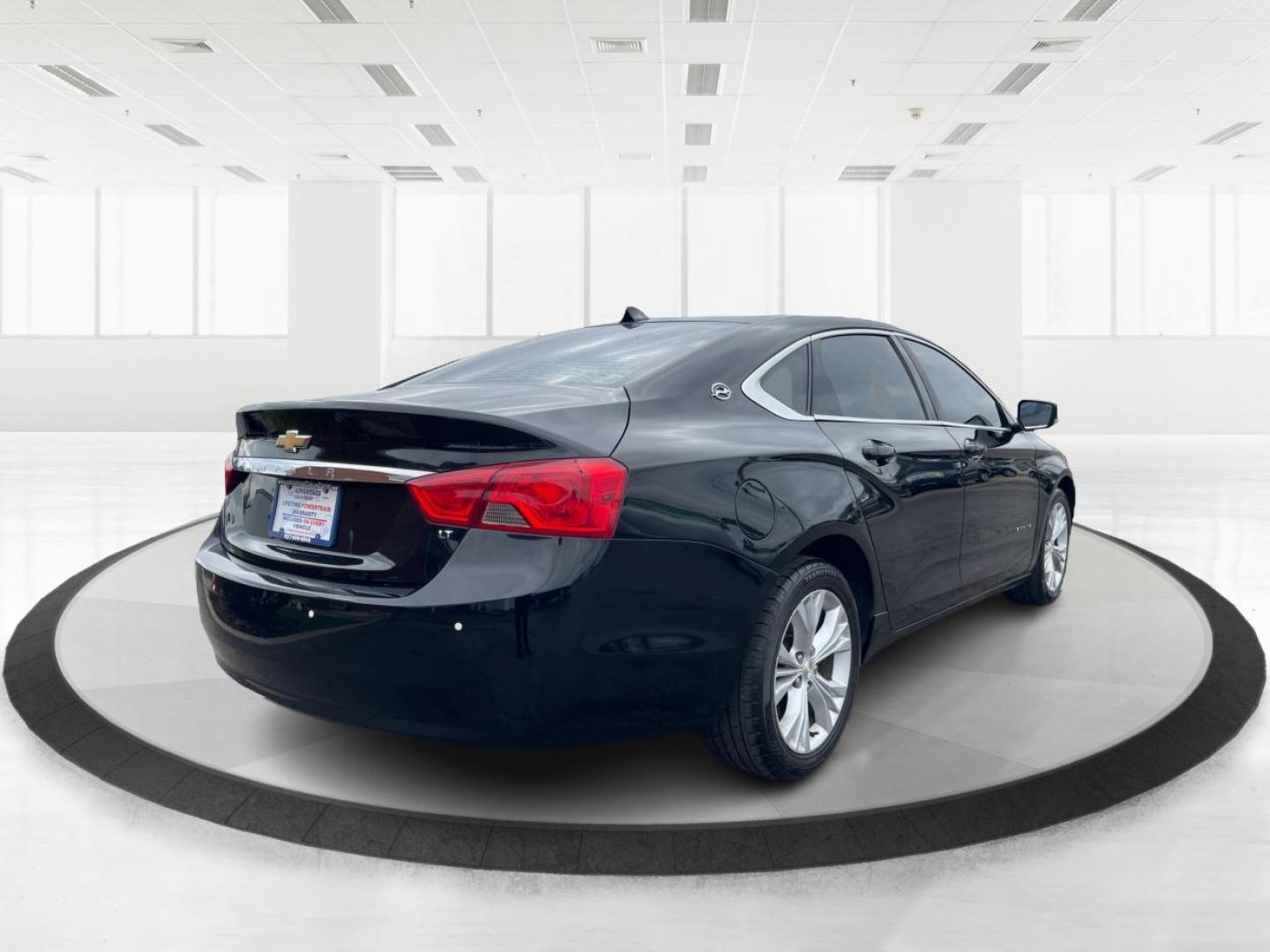 2014 Black Chevrolet Impala 2LT (2G1125S32E9) with an 3.6L V6 DOHC 24VV FFV engine, 6-Speed Automatic transmission, located at 1099 N County Rd 25A , Troy, OH, 45373, (937) 908-9800, 40.057079, -84.212883 - Photo#2