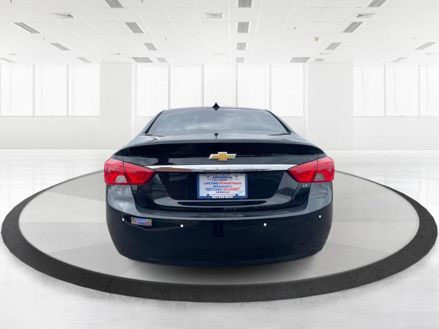 2014 Black Chevrolet Impala 2LT (2G1125S32E9) with an 3.6L V6 DOHC 24VV FFV engine, 6-Speed Automatic transmission, located at 1099 N County Rd 25A , Troy, OH, 45373, (937) 908-9800, 40.057079, -84.212883 - Photo#3