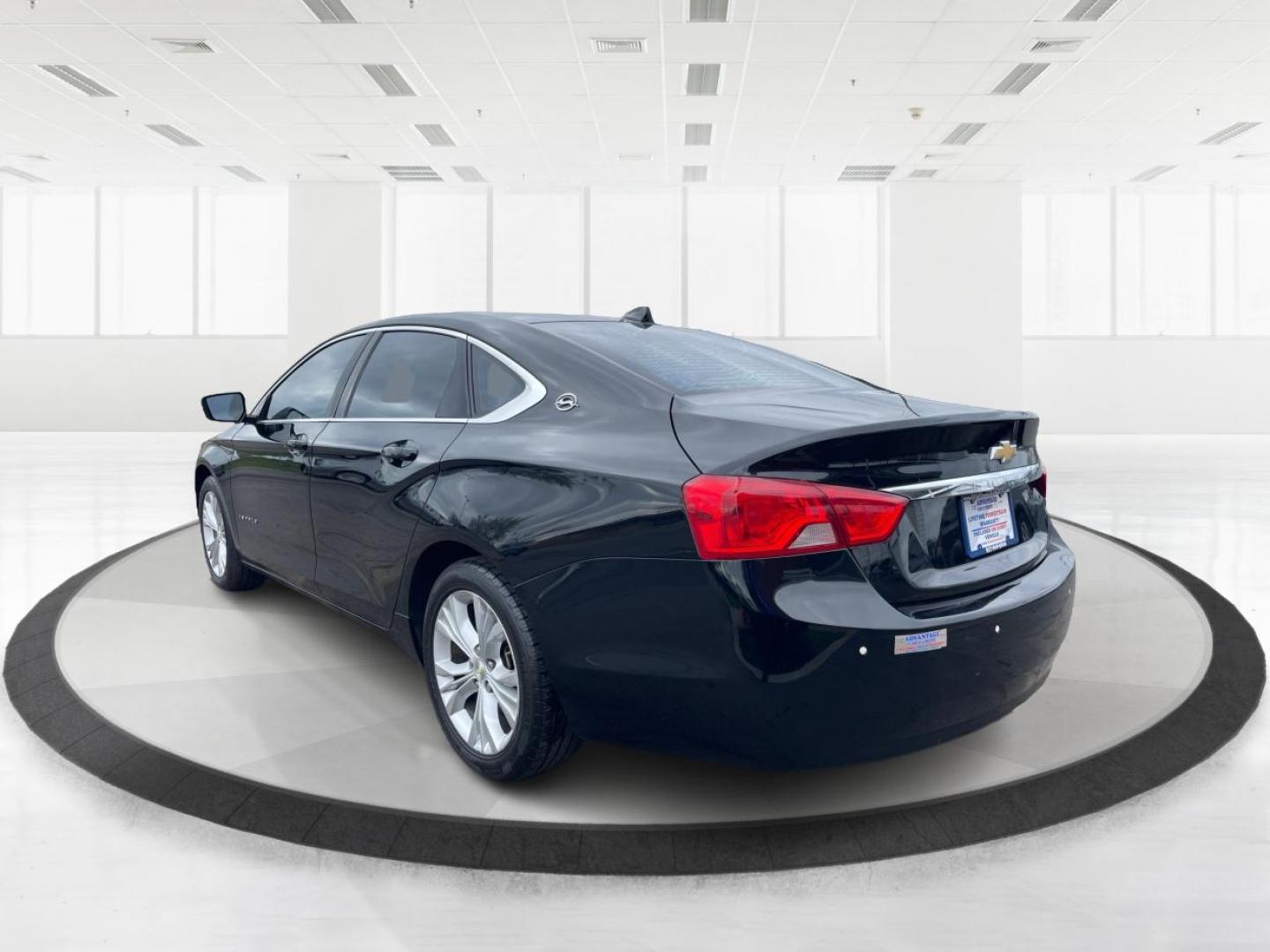 2014 Black Chevrolet Impala 2LT (2G1125S32E9) with an 3.6L V6 DOHC 24VV FFV engine, 6-Speed Automatic transmission, located at 1099 N County Rd 25A , Troy, OH, 45373, (937) 908-9800, 40.057079, -84.212883 - Photo#4