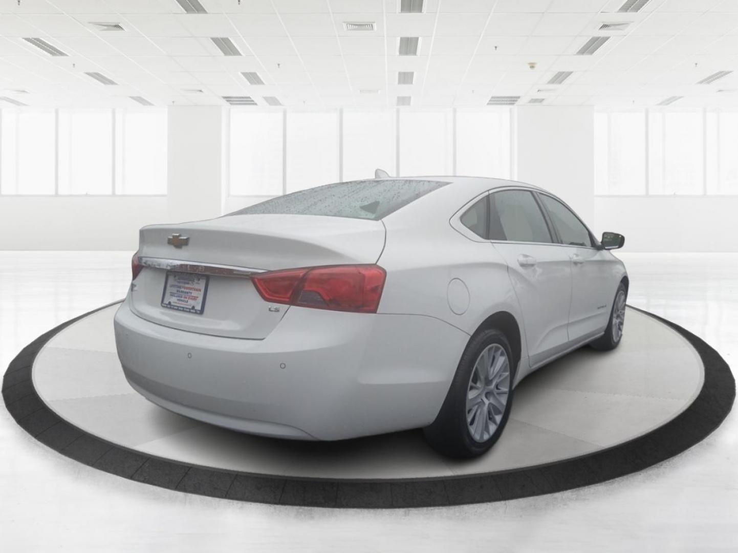 2014 Chevrolet Impala LS (2G11Y5SLXE9) with an 2.5L L4 DOHC 16V engine, 6-Speed Automatic transmission, located at 1099 N County Rd 25A , Troy, OH, 45373, (937) 908-9800, 40.057079, -84.212883 - Photo#2