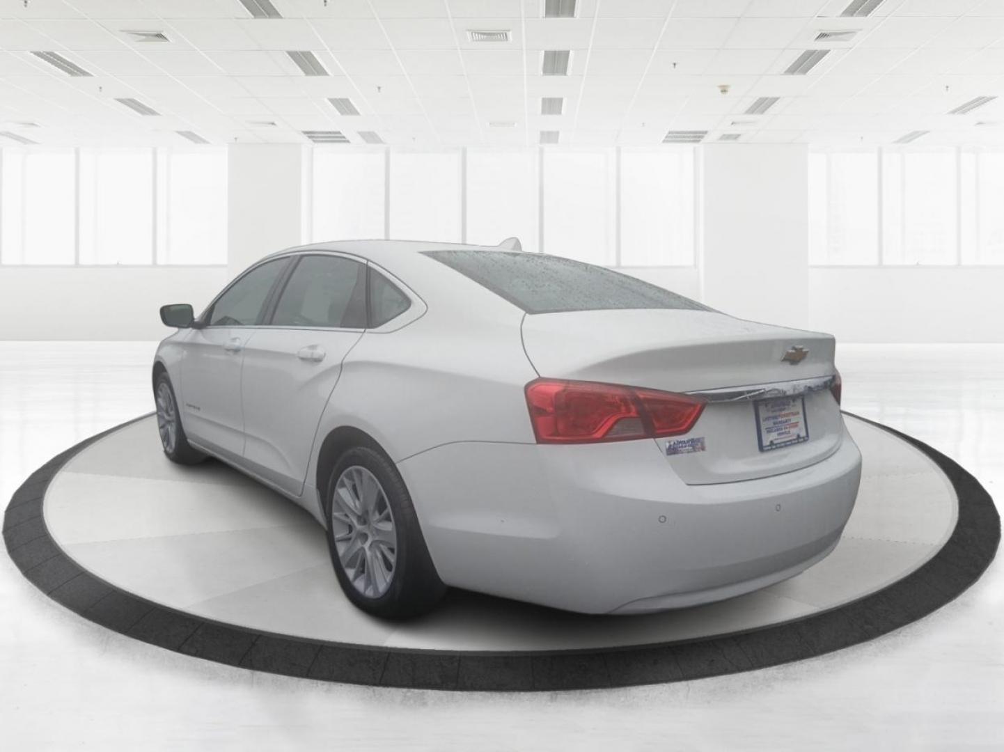 2014 Chevrolet Impala LS (2G11Y5SLXE9) with an 2.5L L4 DOHC 16V engine, 6-Speed Automatic transmission, located at 1099 N County Rd 25A , Troy, OH, 45373, (937) 908-9800, 40.057079, -84.212883 - Photo#4