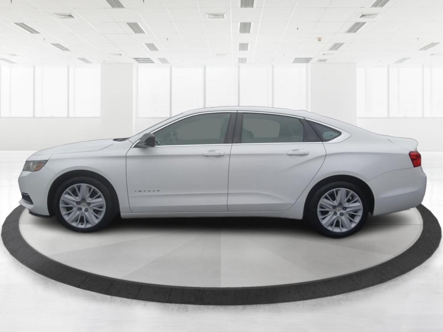 2014 Chevrolet Impala LS (2G11Y5SLXE9) with an 2.5L L4 DOHC 16V engine, 6-Speed Automatic transmission, located at 1099 N County Rd 25A , Troy, OH, 45373, (937) 908-9800, 40.057079, -84.212883 - Photo#5