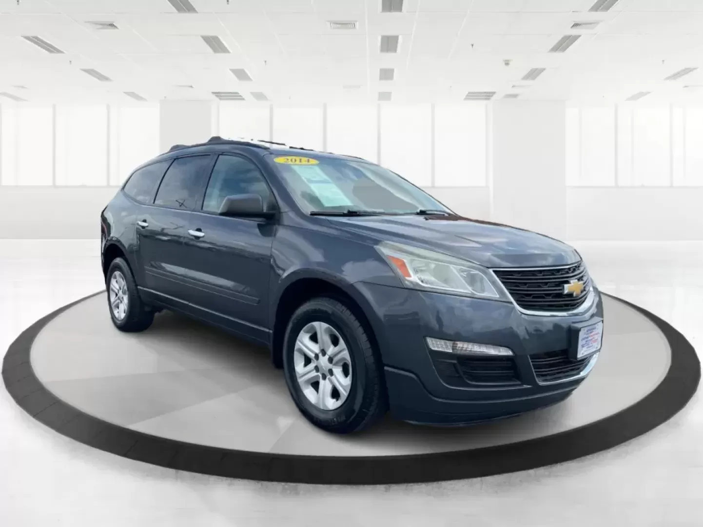 2014 Cyber Gray Metallic Chevrolet Traverse LS FWD w/PDC (1GNKRFED9EJ) with an 3.6L V6 DOHC 24V engine, 6-Speed Automatic transmission, located at 880 E. National Road, Vandalia, OH, 45377, (937) 908-9800, 39.891918, -84.183594 - Photo#0