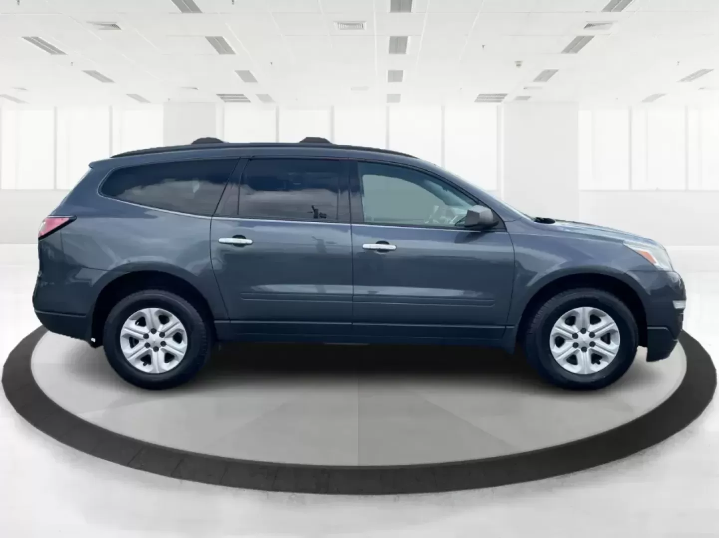 2014 Cyber Gray Metallic Chevrolet Traverse LS FWD w/PDC (1GNKRFED9EJ) with an 3.6L V6 DOHC 24V engine, 6-Speed Automatic transmission, located at 880 E. National Road, Vandalia, OH, 45377, (937) 908-9800, 39.891918, -84.183594 - Photo#1