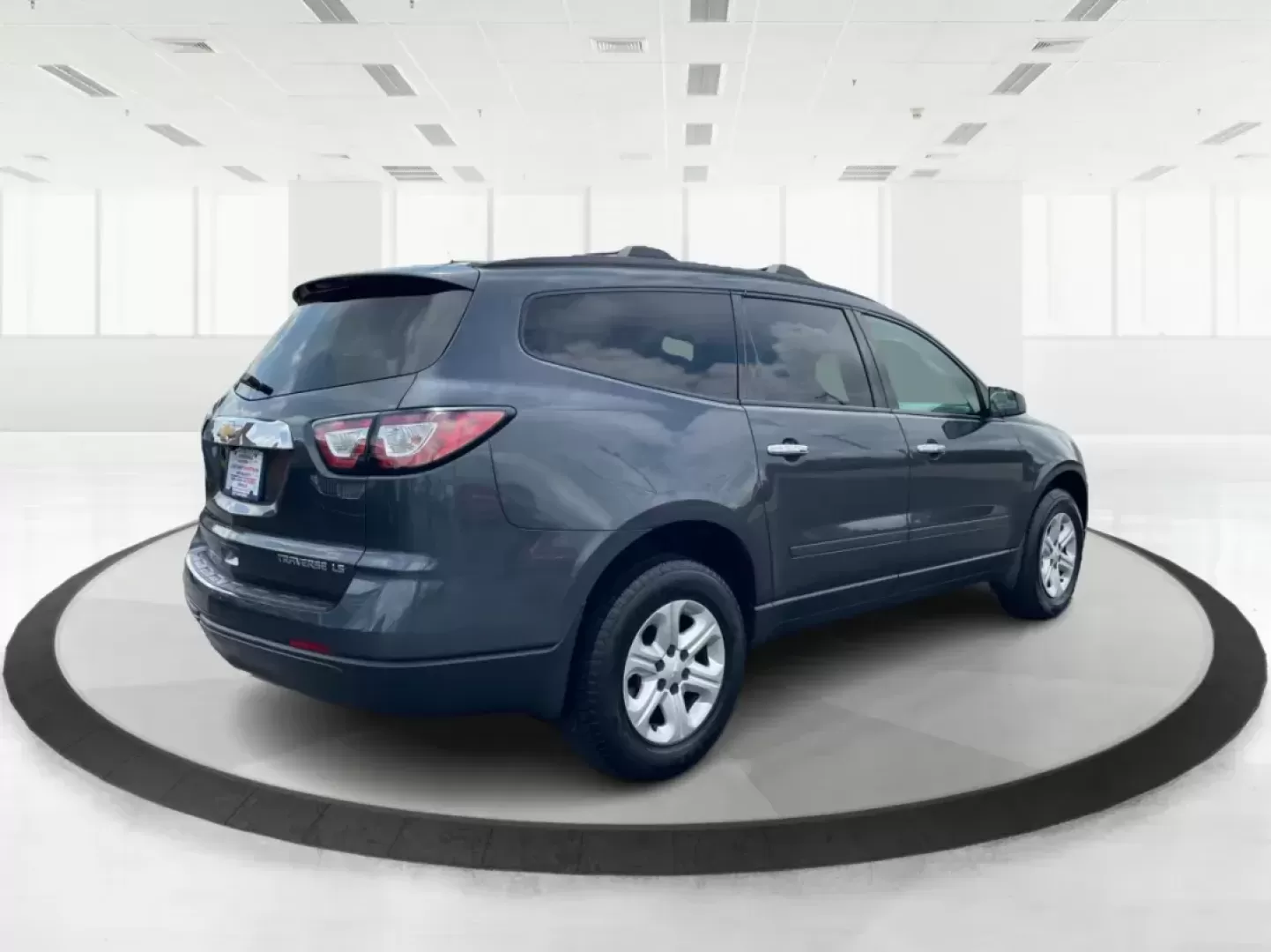 2014 Cyber Gray Metallic Chevrolet Traverse LS FWD w/PDC (1GNKRFED9EJ) with an 3.6L V6 DOHC 24V engine, 6-Speed Automatic transmission, located at 880 E. National Road, Vandalia, OH, 45377, (937) 908-9800, 39.891918, -84.183594 - Photo#2