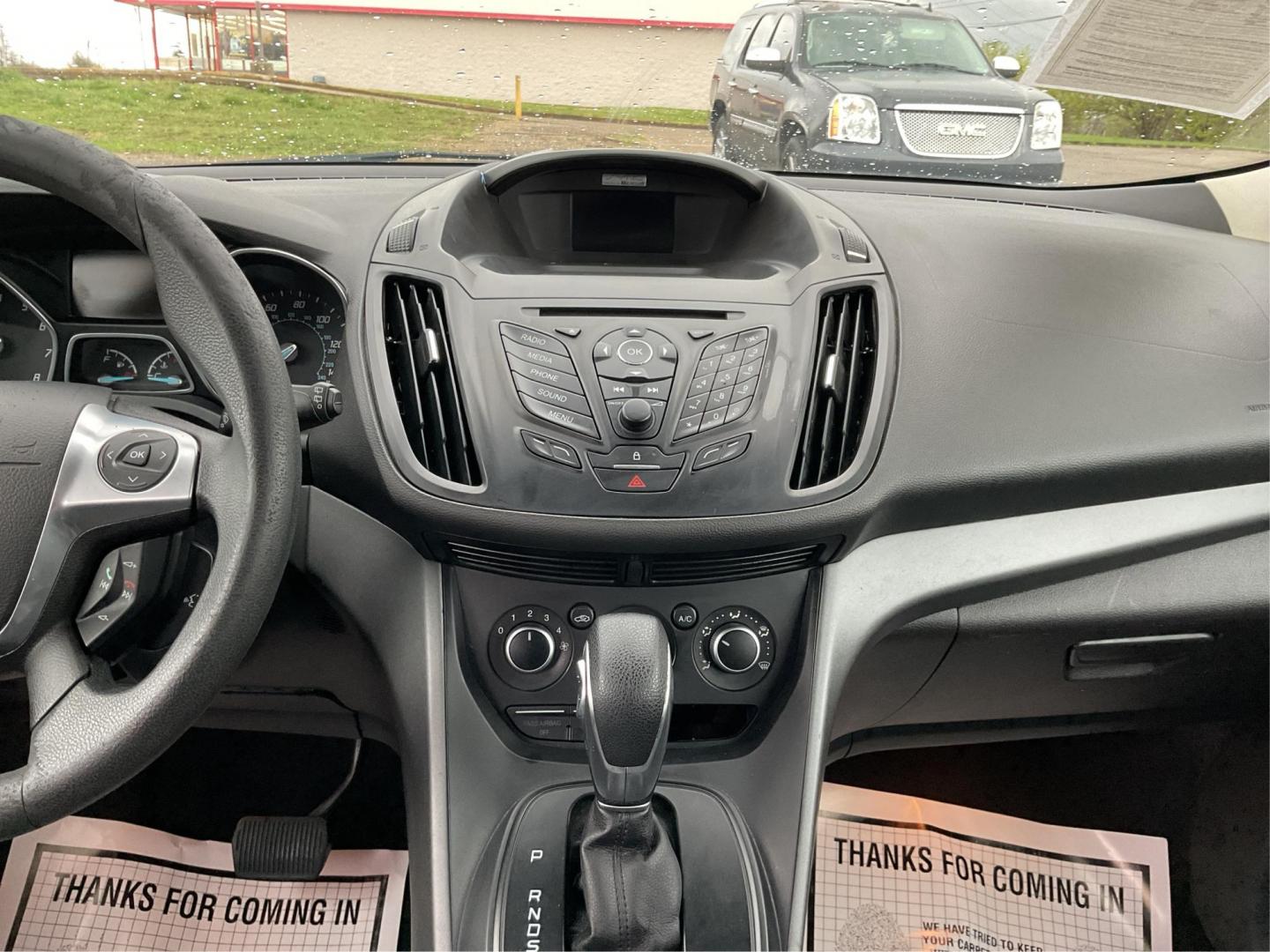 2014 Ford Escape S FWD (1FMCU0F71EU) with an 2.5L L4 DOHC 16V engine, 6-Speed Automatic transmission, located at 1099 N County Rd 25A , Troy, OH, 45373, (937) 908-9800, 40.057079, -84.212883 - Photo#12