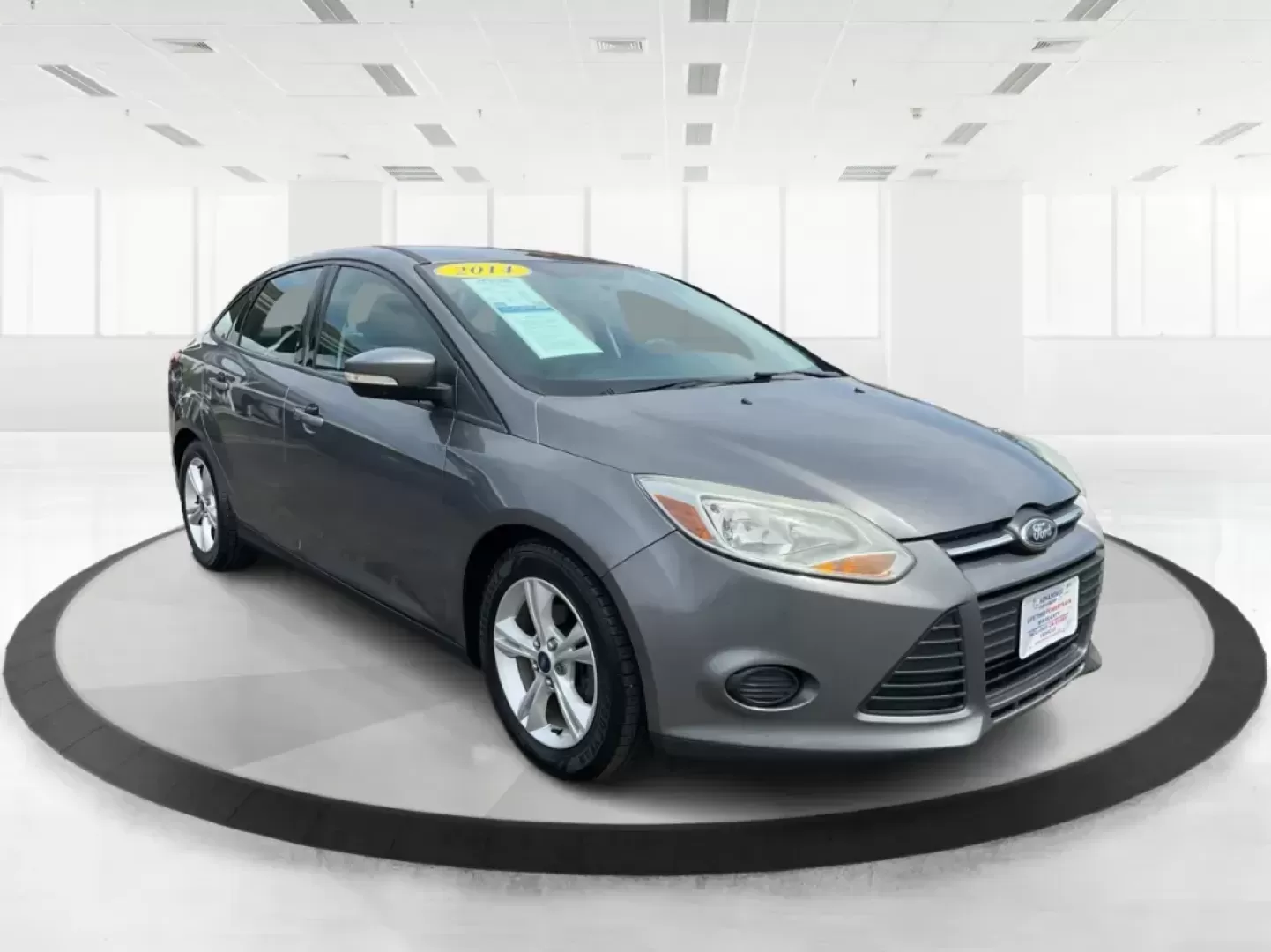 2014 Ford Focus SE (1FADP3F21EL) with an 2L I-4 gasoline direct injection engine, located at 1099 N County Rd 25A , Troy, OH, 45373, (937) 908-9800, 40.057079, -84.212883 - Photo#0