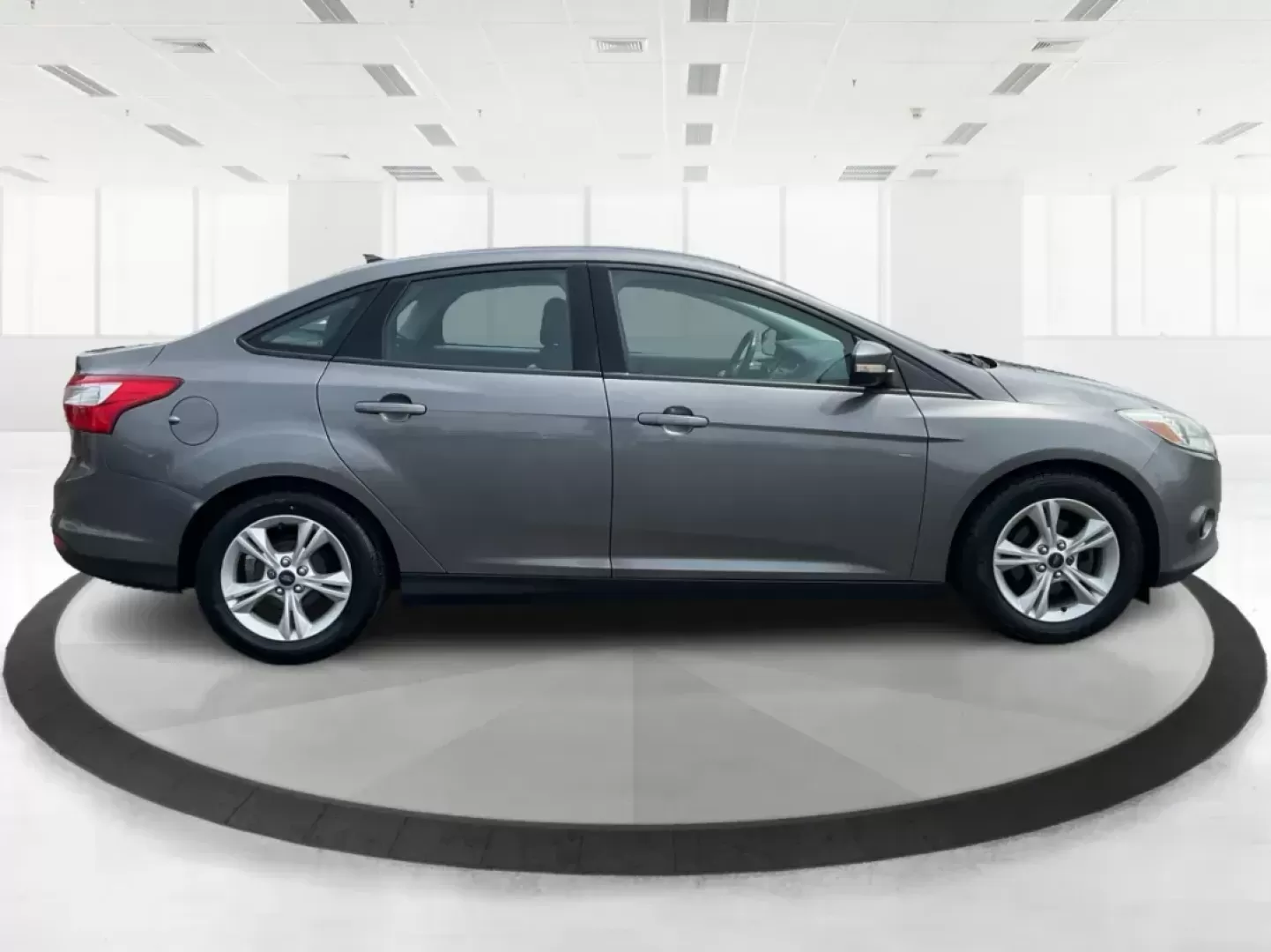 2014 Ford Focus SE (1FADP3F21EL) with an 2L I-4 gasoline direct injection engine, located at 1099 N County Rd 25A , Troy, OH, 45373, (937) 908-9800, 40.057079, -84.212883 - Photo#1