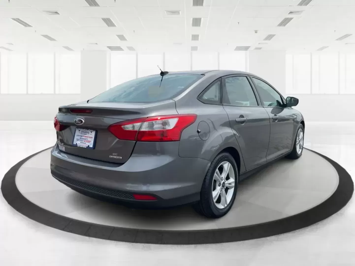 2014 Ford Focus SE (1FADP3F21EL) with an 2L I-4 gasoline direct injection engine, located at 1099 N County Rd 25A , Troy, OH, 45373, (937) 908-9800, 40.057079, -84.212883 - Photo#2